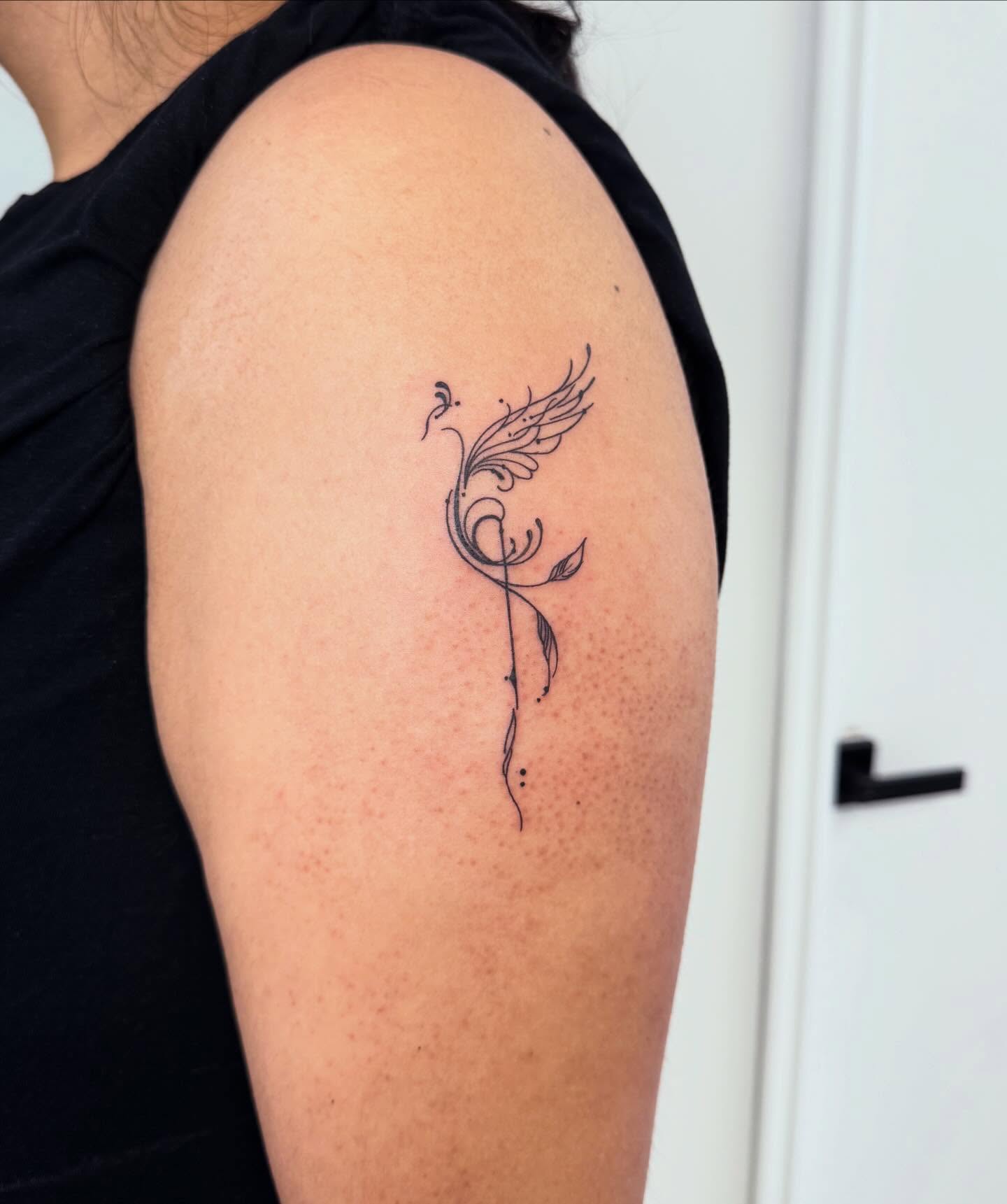 Winged plant fine line tattoo on the shoulder by Angela Nery, South Jordan, Utah