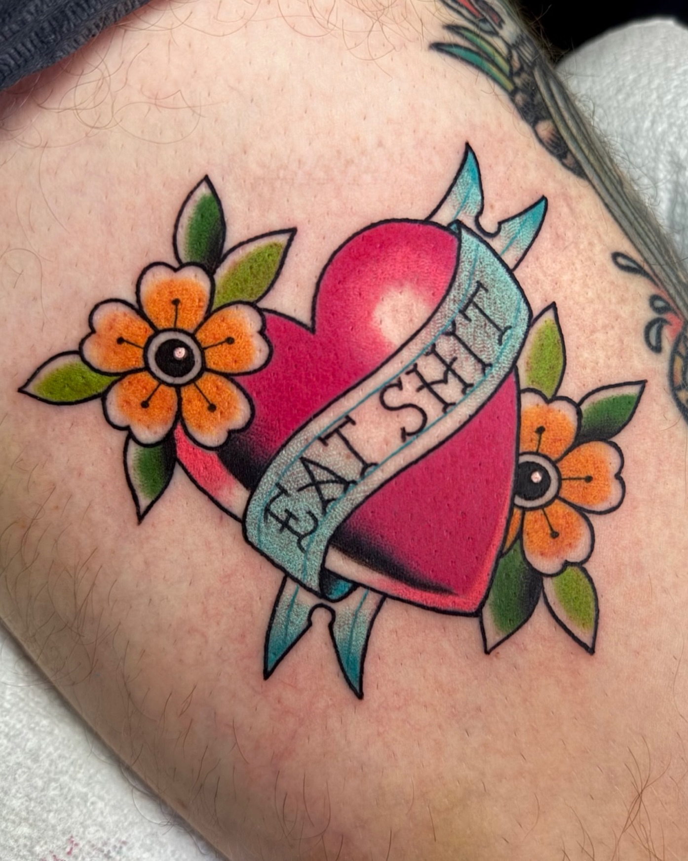Heart with ribbon American traditional tattoo on the forearm by 𝔎𝔦𝔯𝔞 𝔅𝔦𝔰𝔥𝔬𝔭