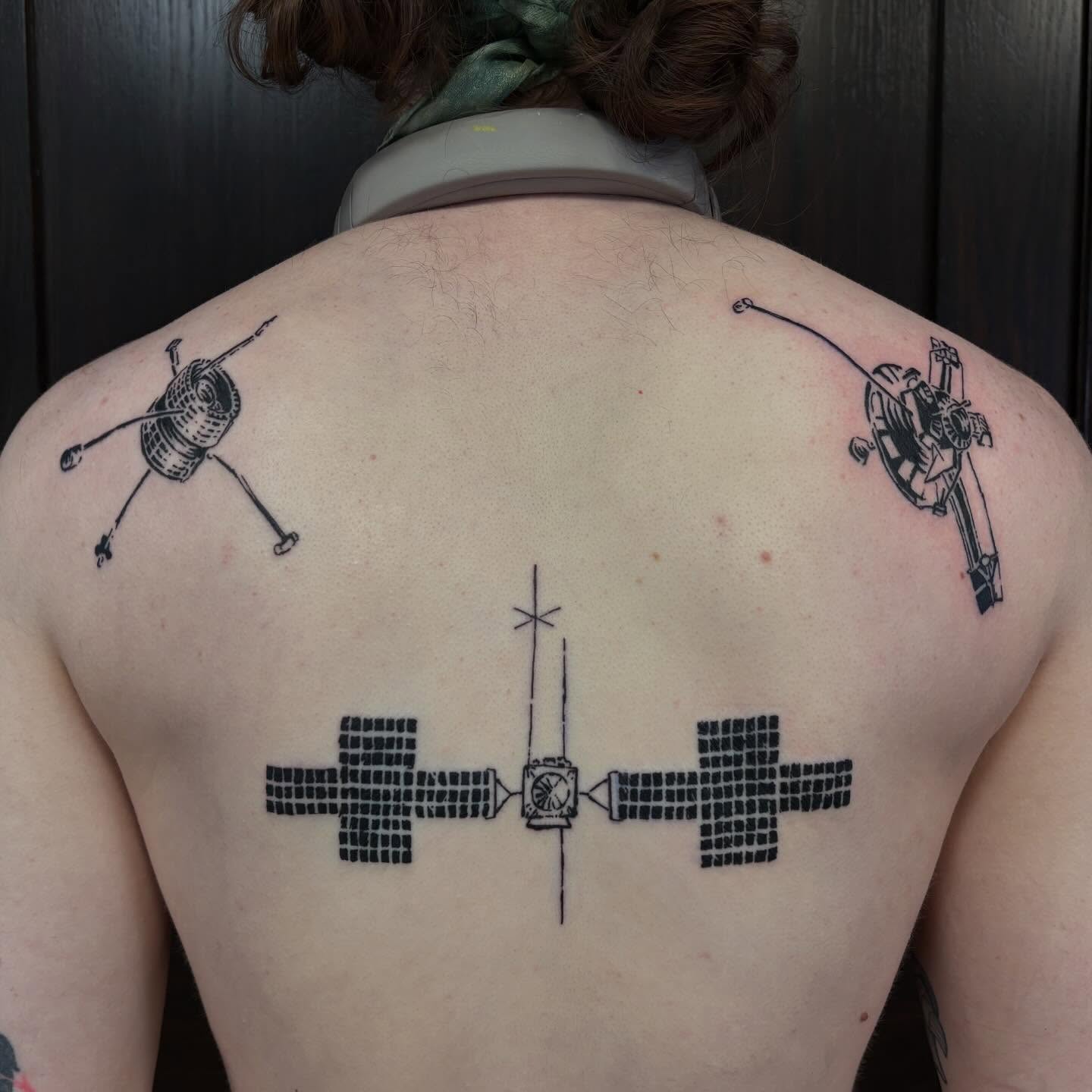 Space station dotwork tattoo on the back by kane