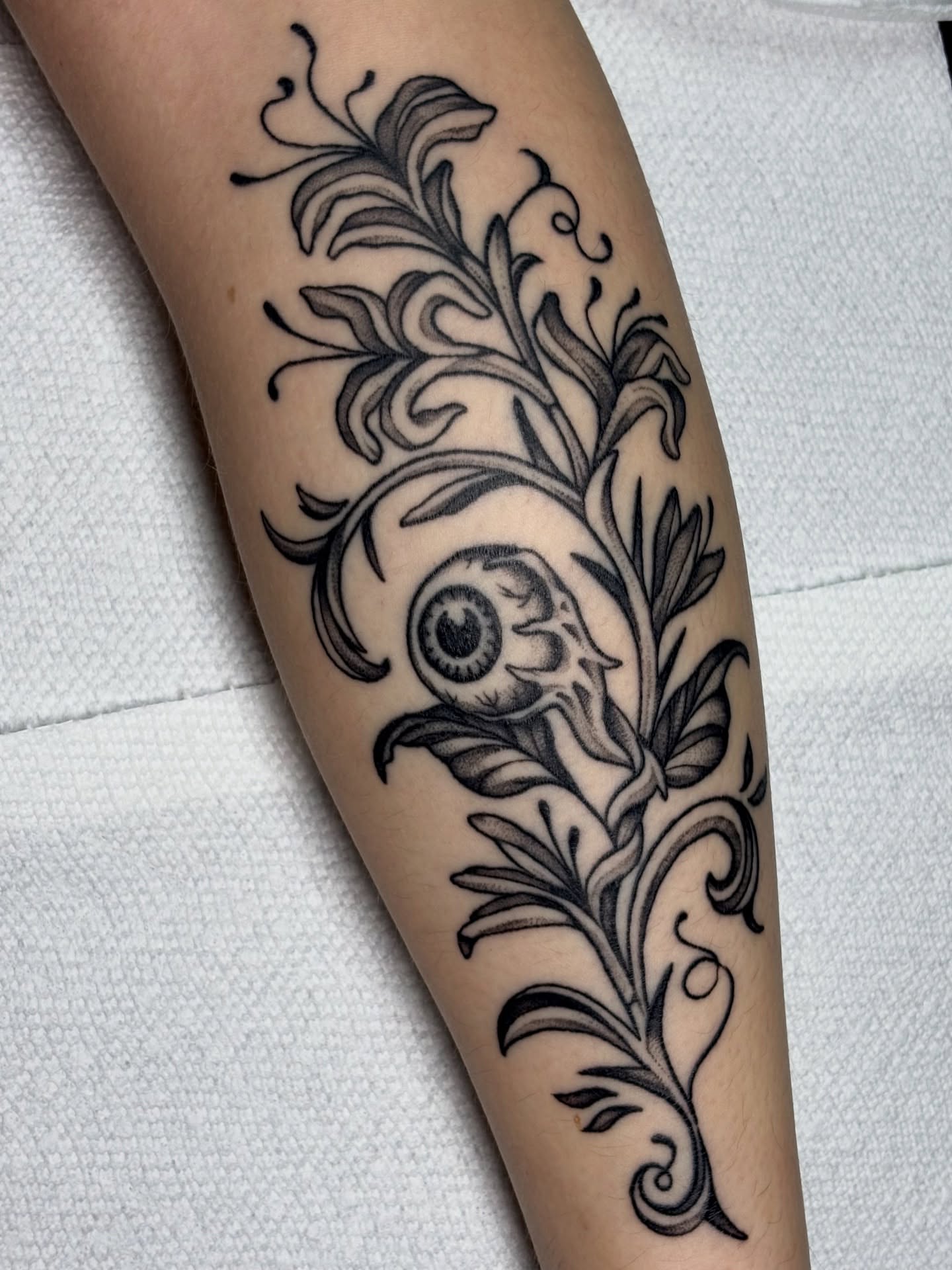 Eye and floral vine ornamental tattoo on the forearm by ✨madison✨, Portland, Oregon