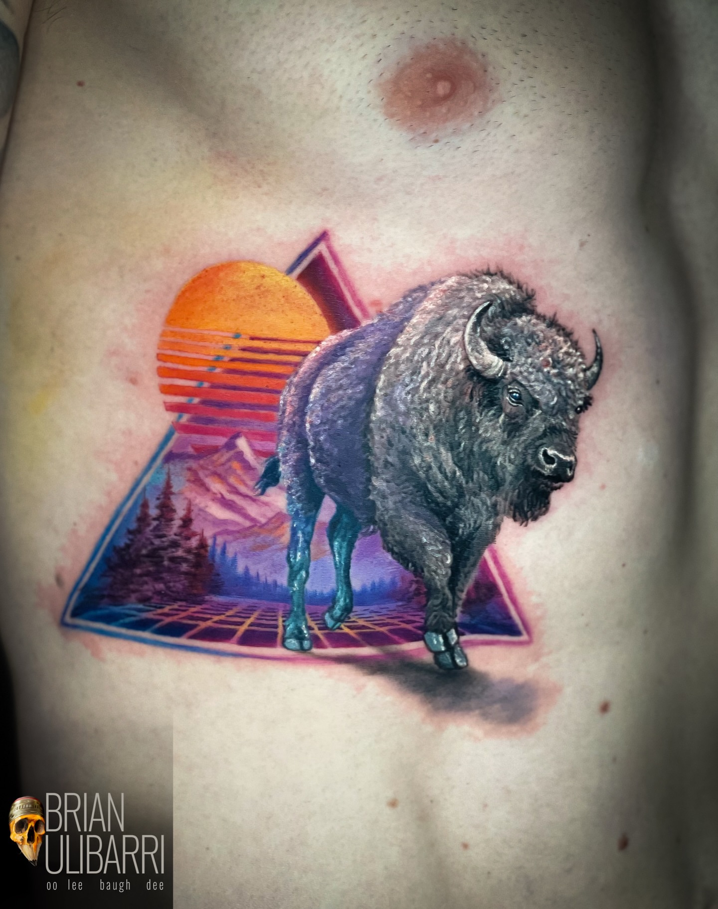 Bison realism tattoo on the ribs by Brian Ulibarri