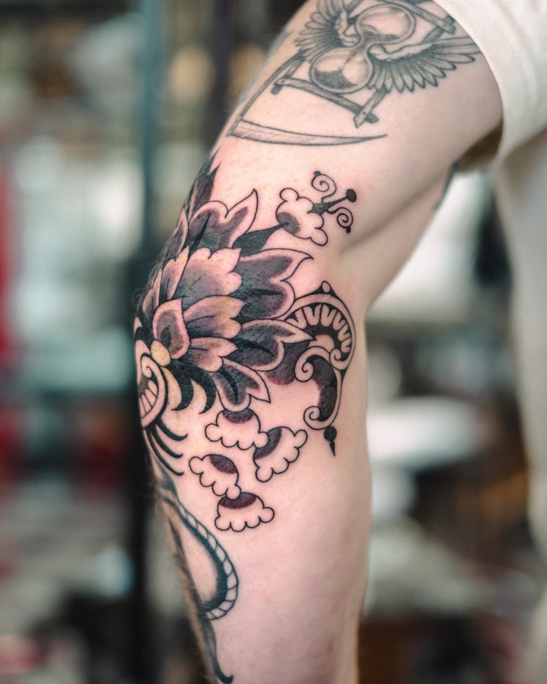 Floral design black and grey tattoo on the forearm by Dan Gilsdorf, Portland, Oregon
