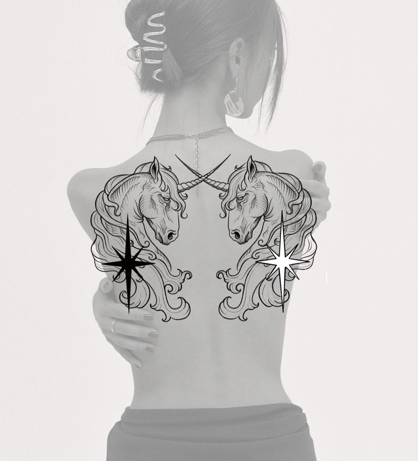 Unicorns black and grey tattoo on the back by Anna Soeterboek