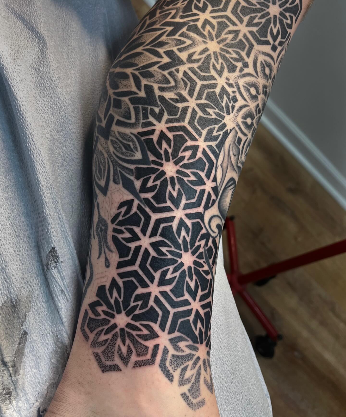Tattoo by @rockylovetattoos — dotwork, geometric