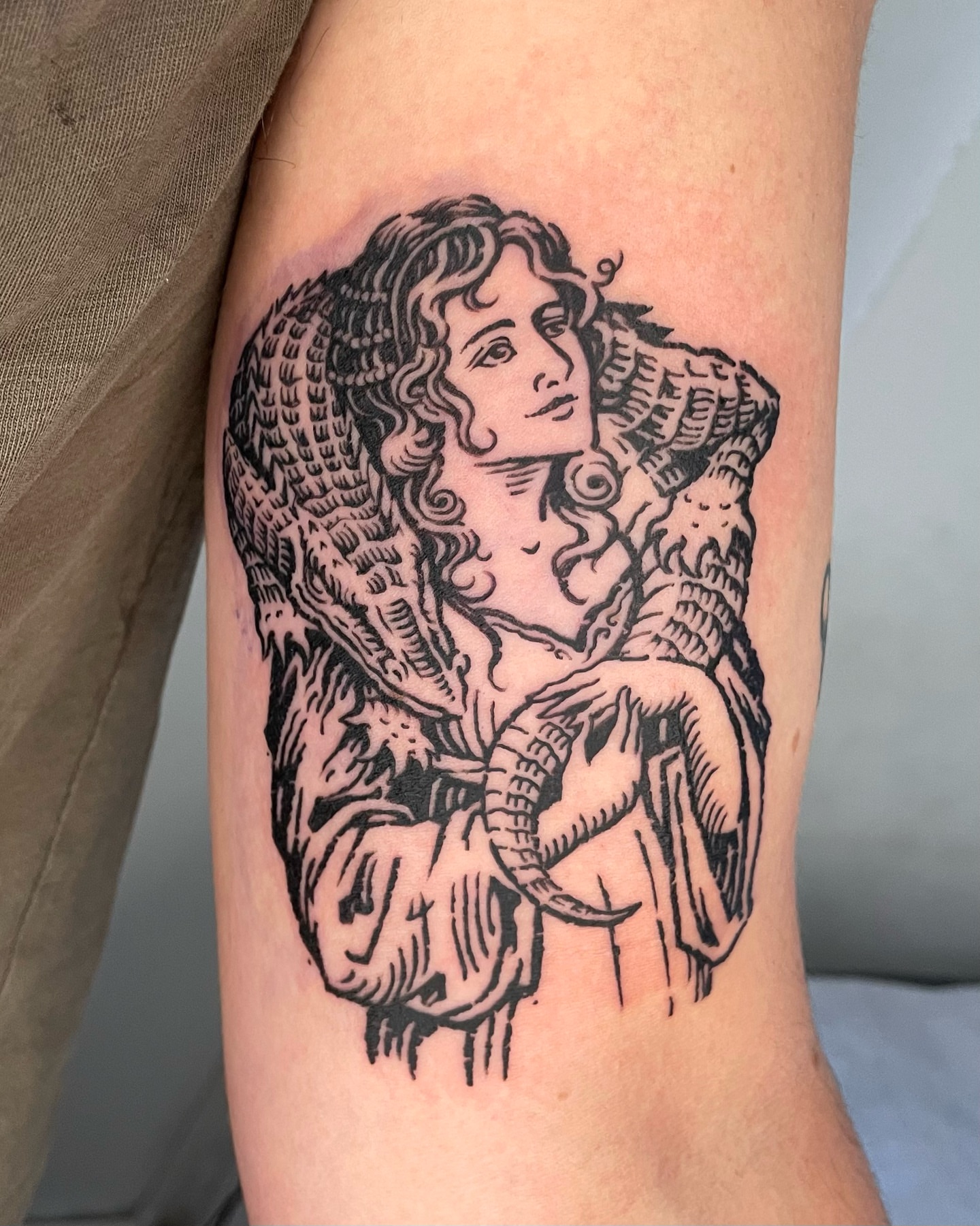 Angel black and grey tattoo on the forearm by Anh Đan