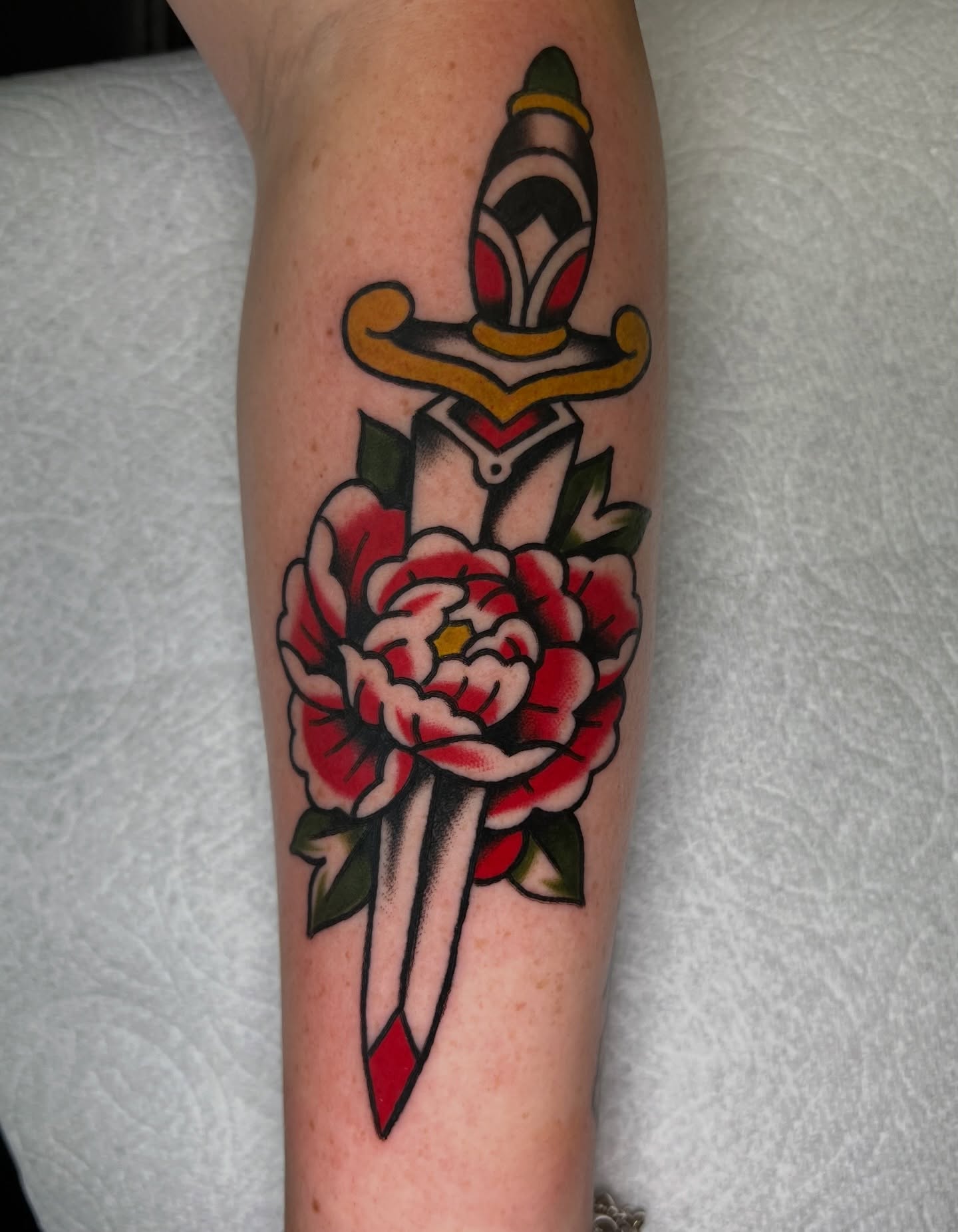 Sword and flower American traditional tattoo on the forearm by 🍊Harvey Perez 🍊, Deerfield Beach, Florida