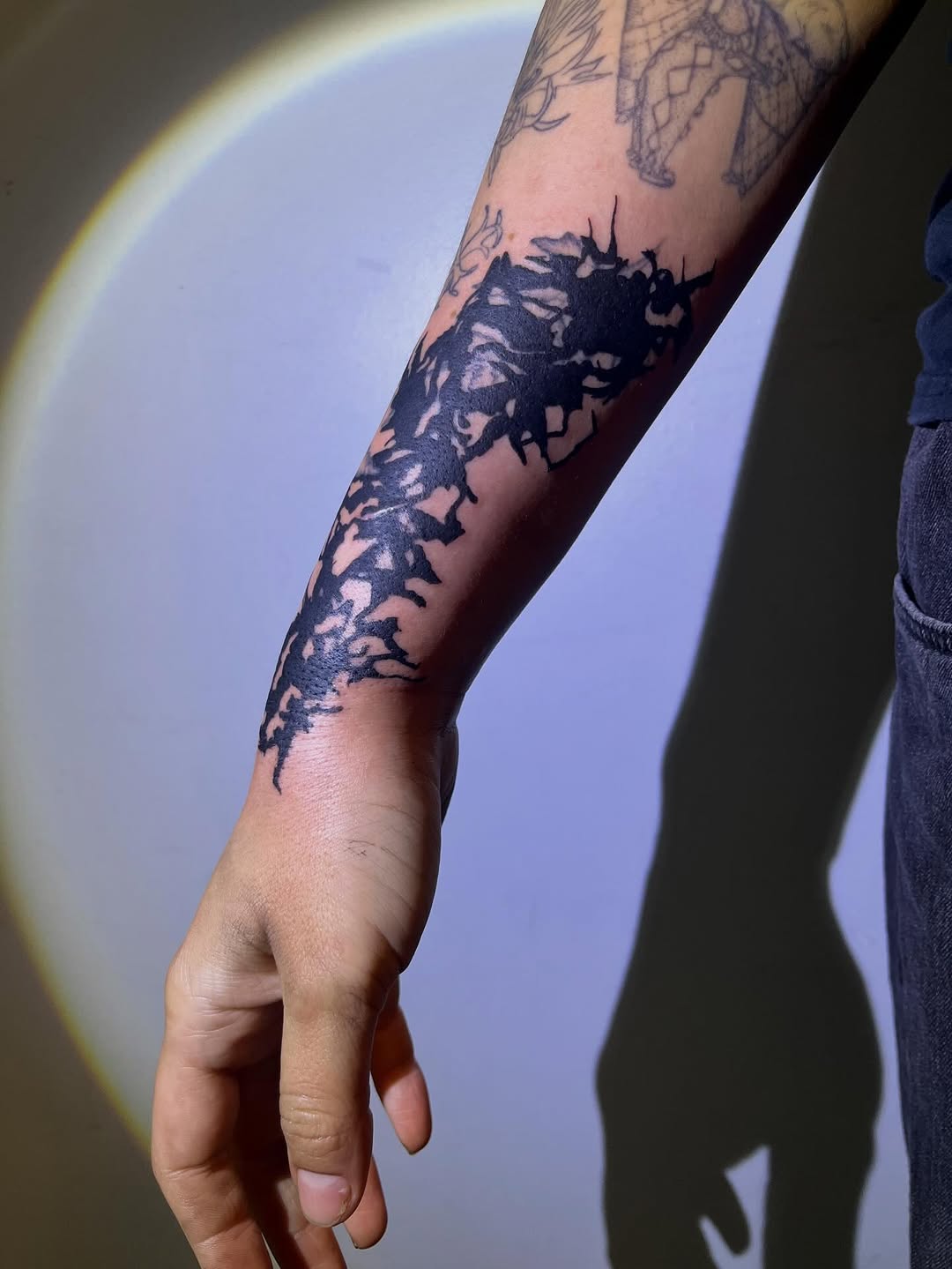 Abstract black ink cyber sigilism tattoo on the forearm by @godsfirmgrip