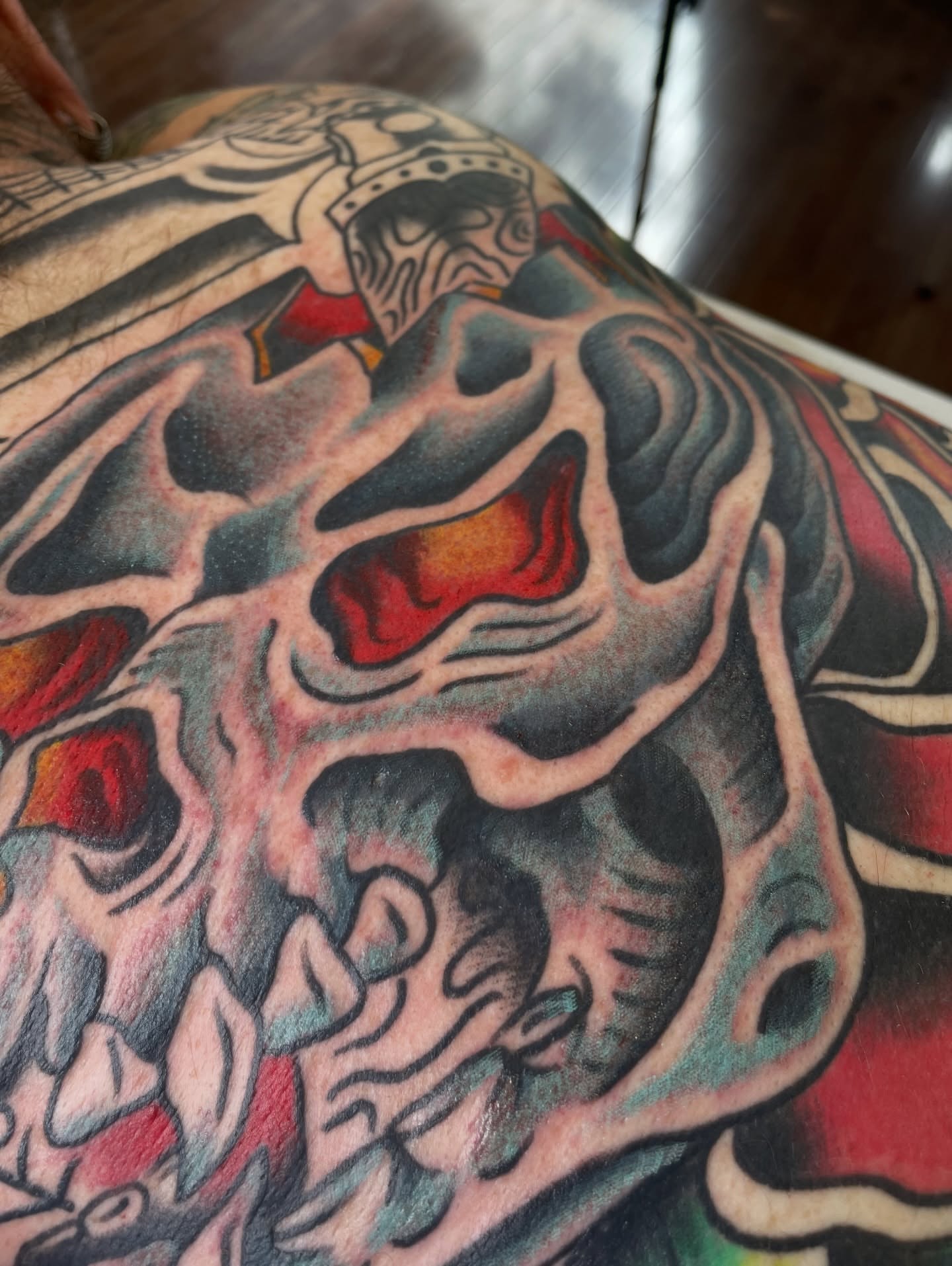 Tiger American traditional tattoo on the thigh by Chris Martin