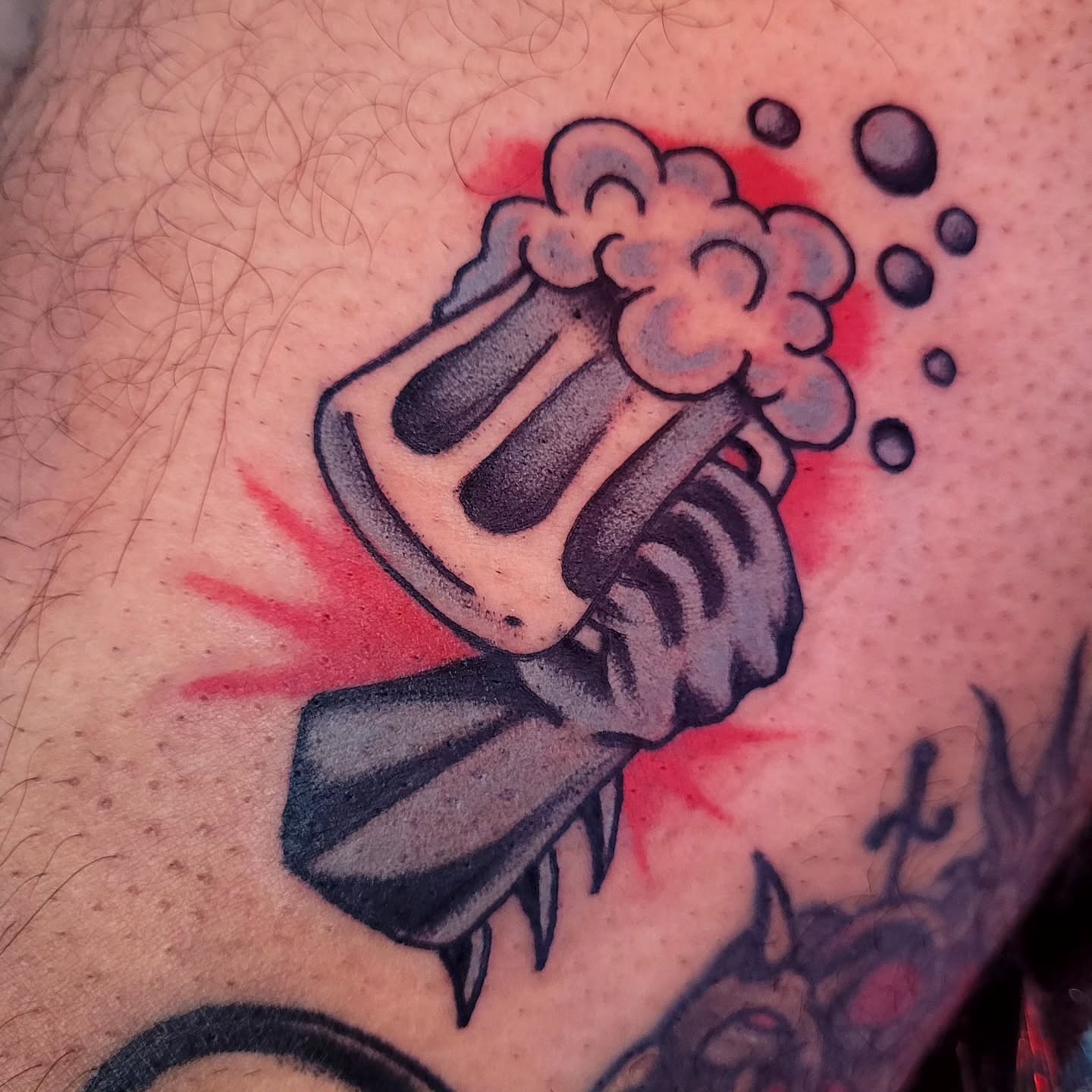 Beer mug American traditional tattoo on the forearm by S. Madrid