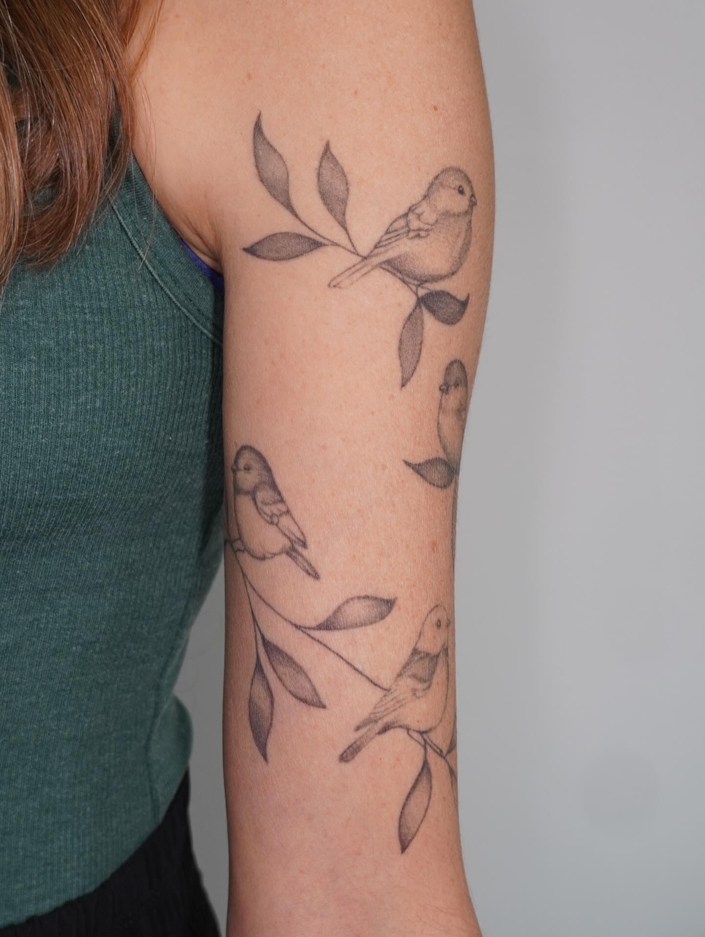 Birds and leaves black and grey tattoo on the forearm by Presley Tattoos, Murfreesboro, Tennessee