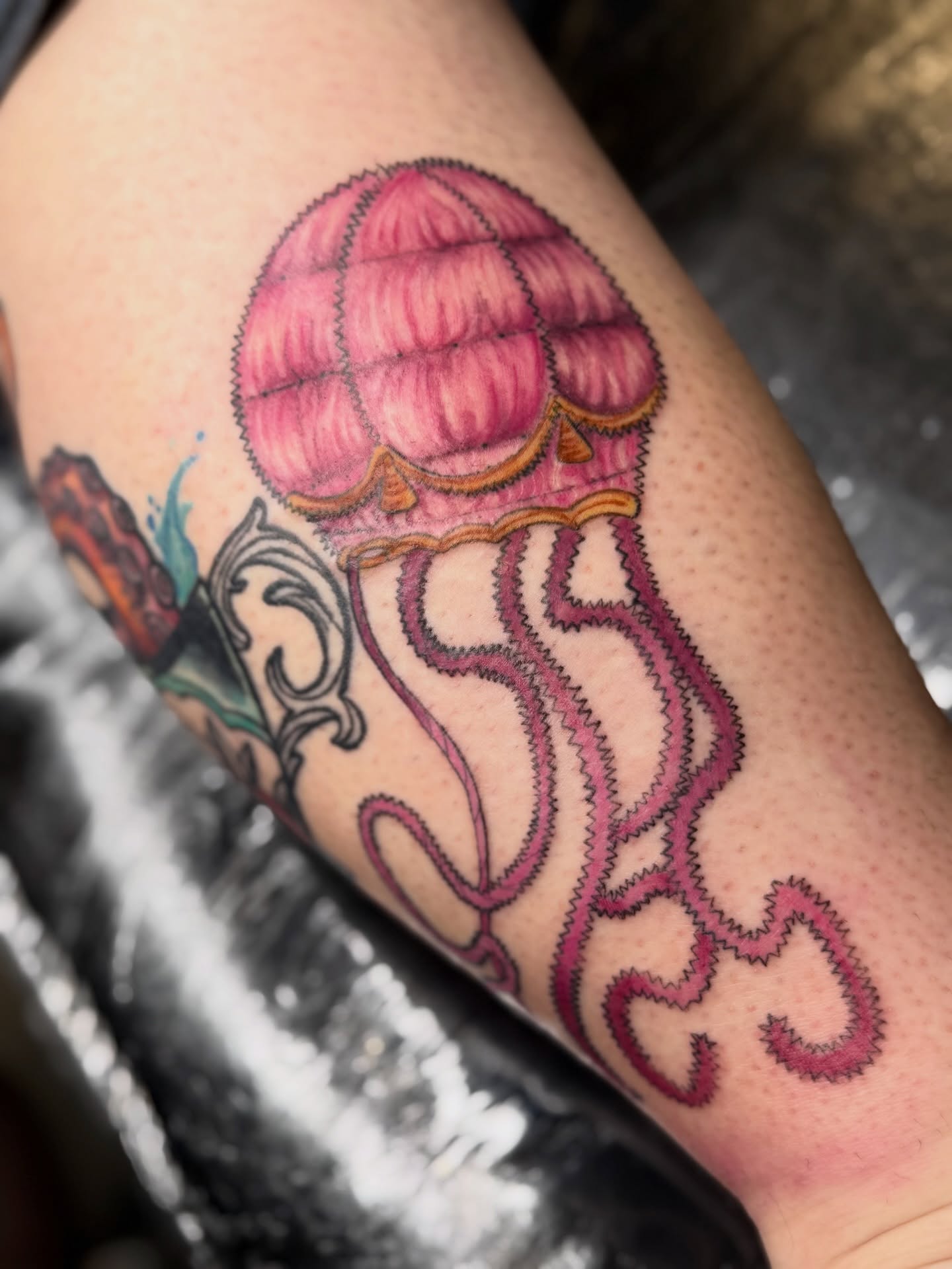 Jellyfish new school tattoo on the thigh by Jennifer Contreras