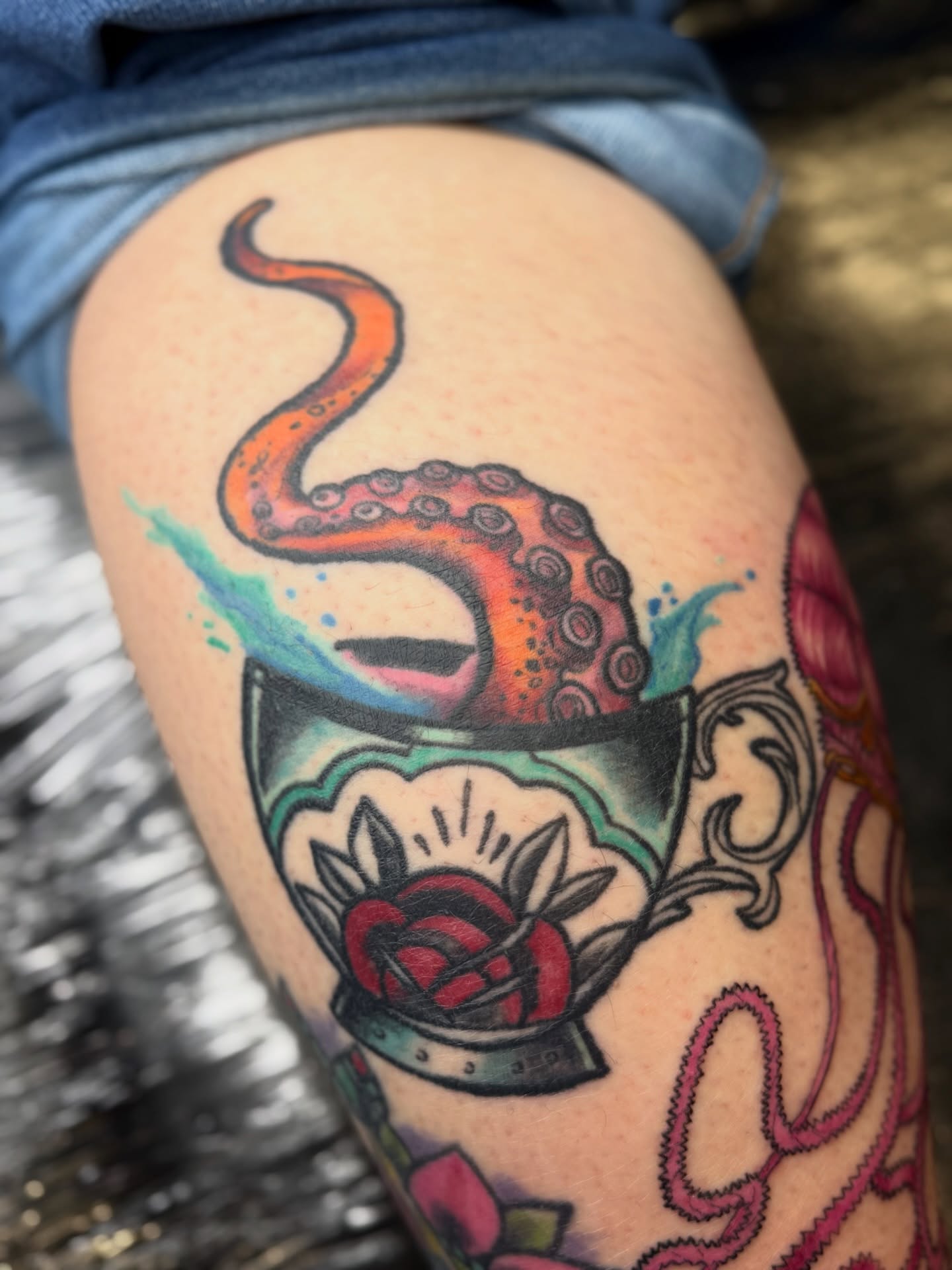 Octopus in coffee cup American traditional tattoo on the thigh by Jennifer Contreras