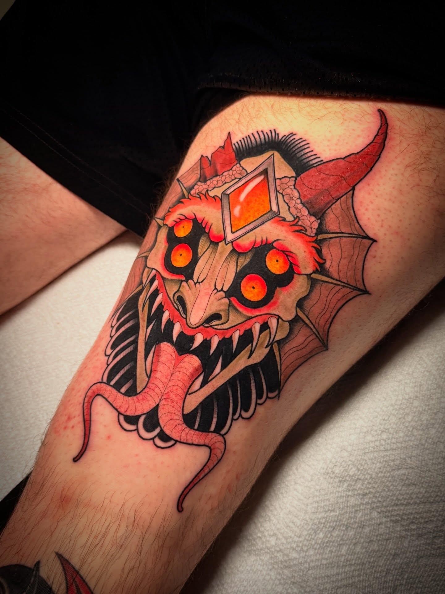 Demon American traditional tattoo on the forearm by Dave Osrowitz