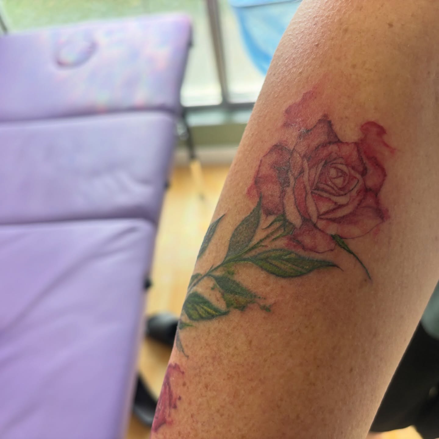 Rose realism tattoo on the forearm by Ivanna