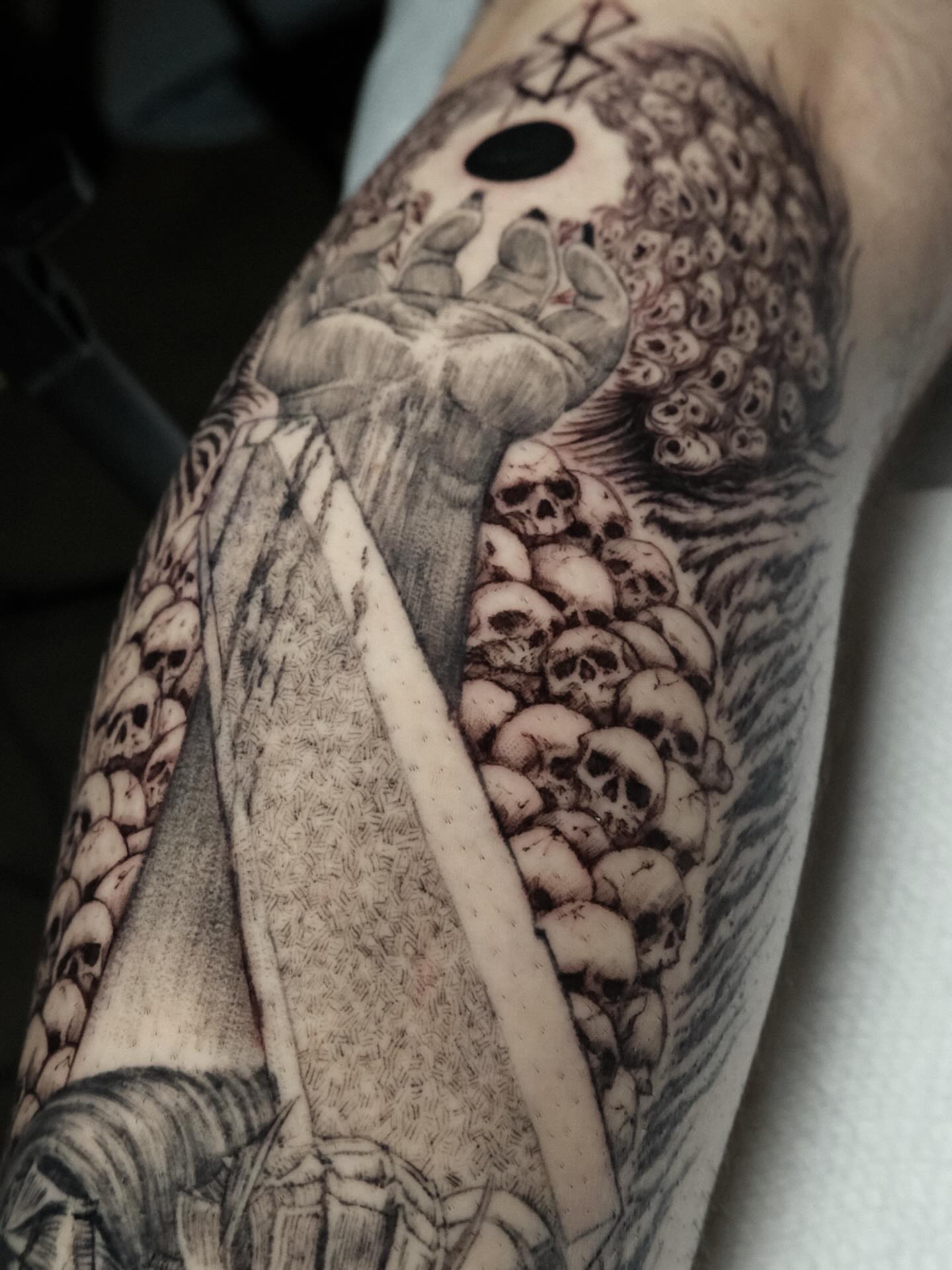 Skulls and hand realism tattoo on the forearm by HanaKaki