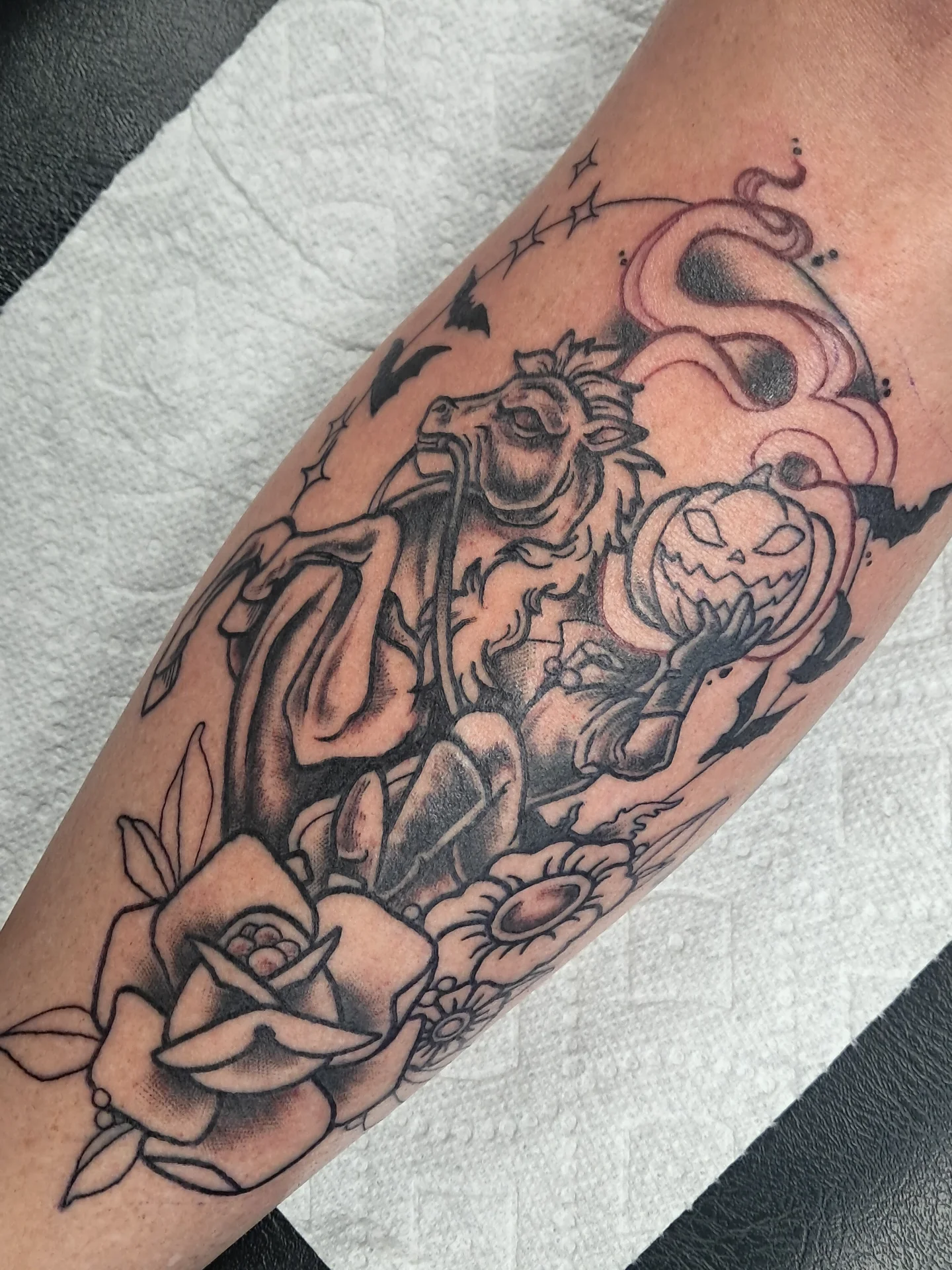 Goat and pumpkin American traditional tattoo on the forearm by Erika Hollingsworth