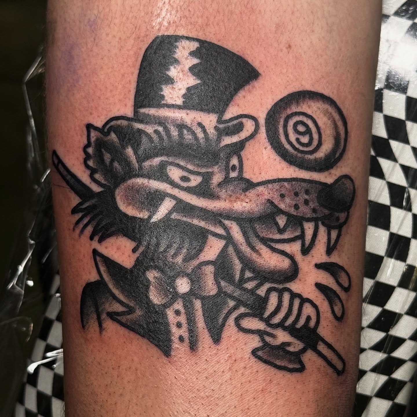 Clown dog black and grey tattoo on the forearm by ๐ฎ๐๐๐๐ ๐ญ๐๐๐๐๐