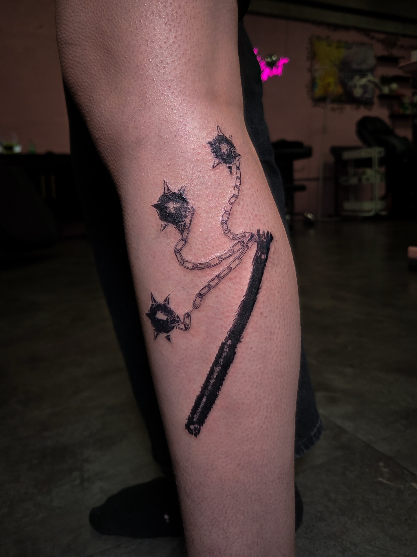 Chainsaw blade black and grey tattoo on the leg by Tattoo Artist X Kamm, Salt Lake City, Utah