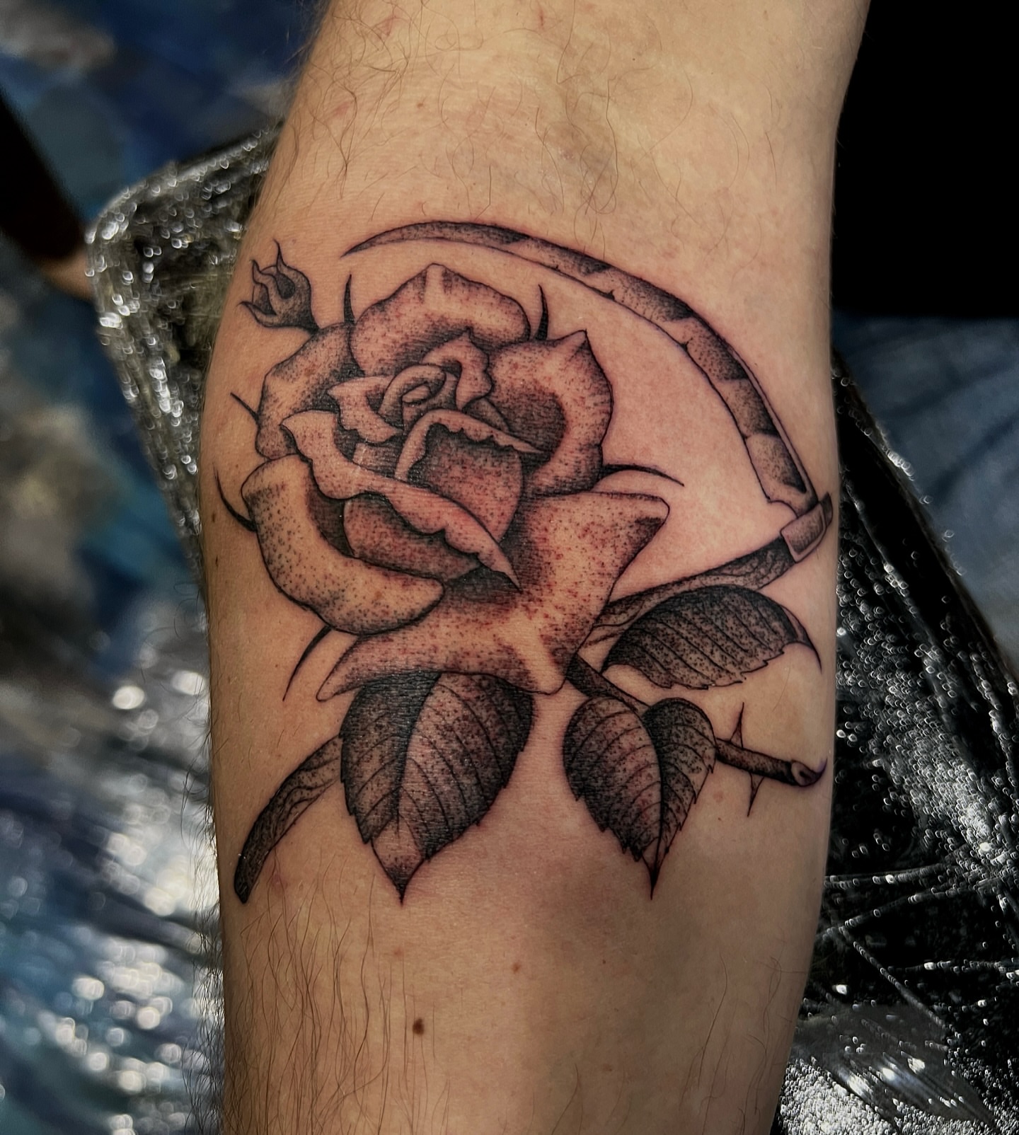 Rose dotwork tattoo on the forearm by David Delacruz