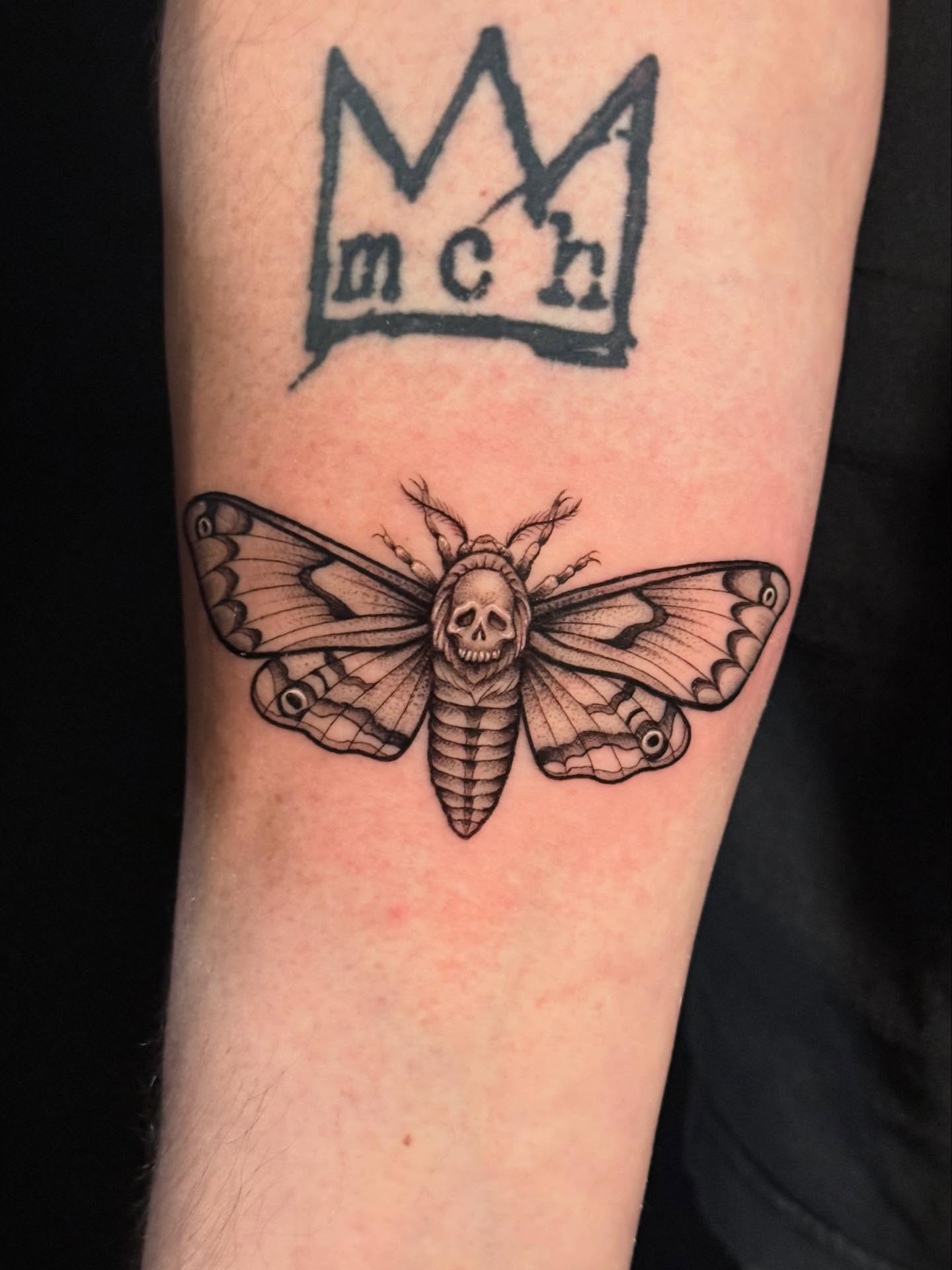 Death moth realism tattoo on the forearm by HAiZiE