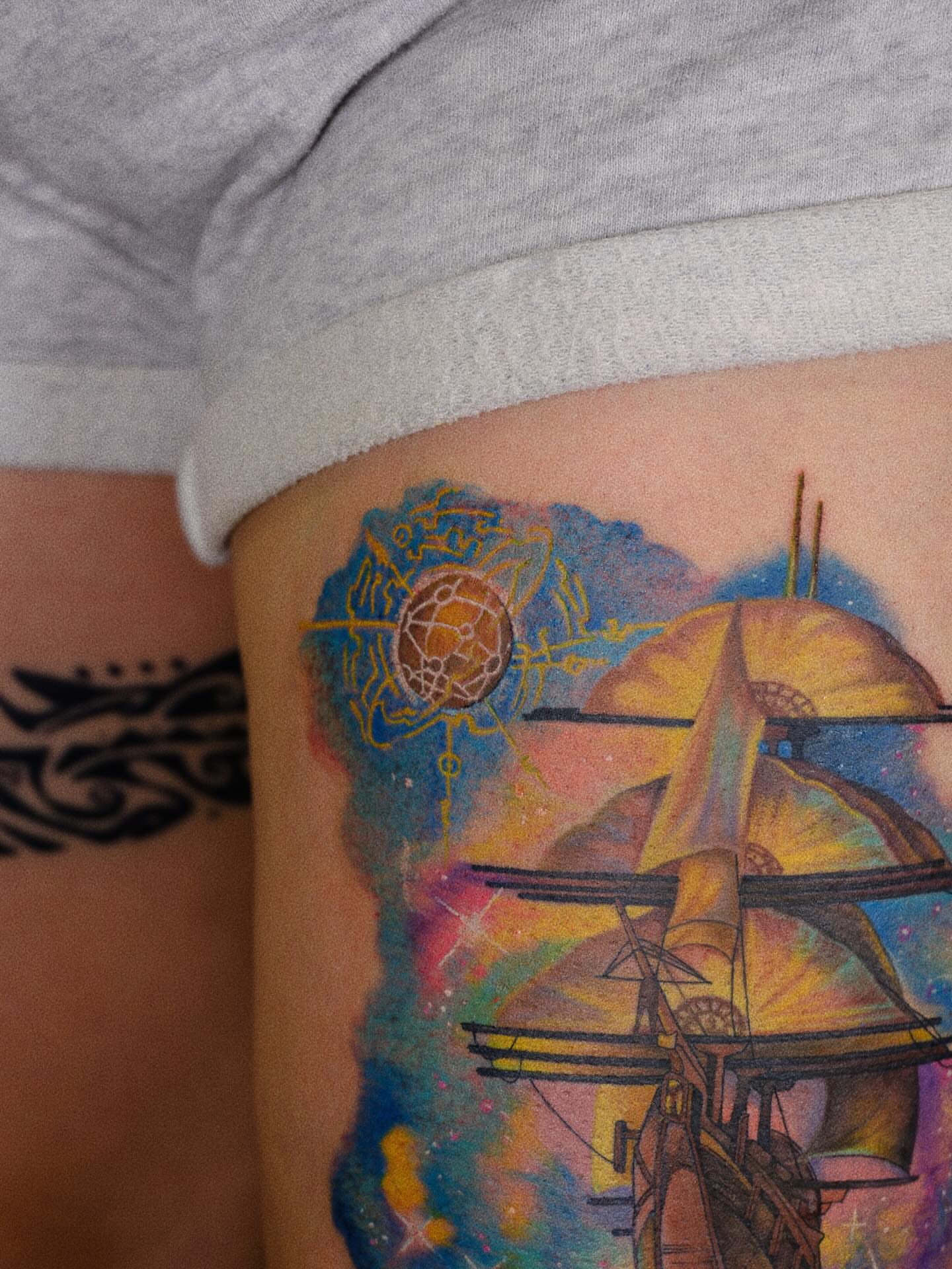 Astronaut and ship dotwork tattoo on the thigh by rita_tattooist