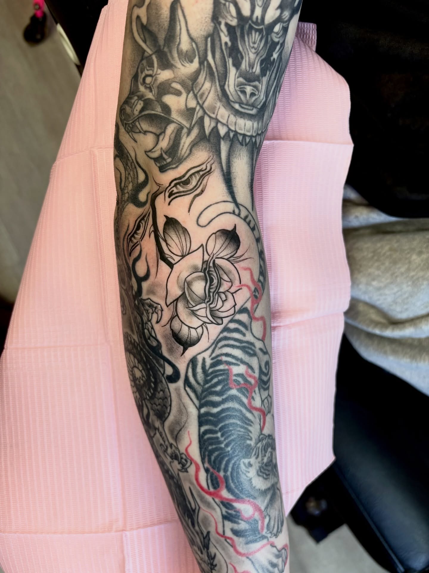 Dragon and rose realism tattoo on the forearm by Elixabeth