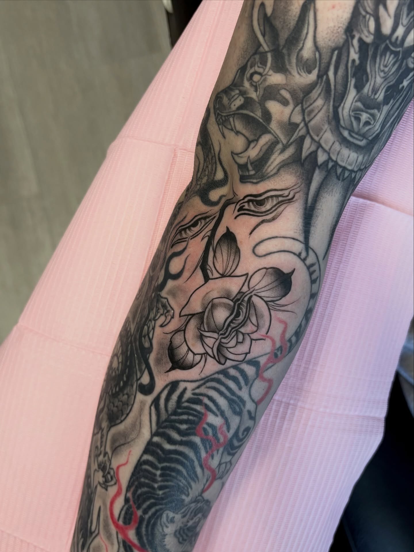 Tiger and snake japanese irezumi tattoo on the forearm by Elixabeth