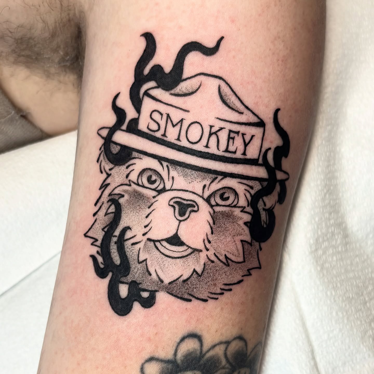 Smokey bear black and grey tattoo on the forearm by ๐ฅ Jas ๐ฅ