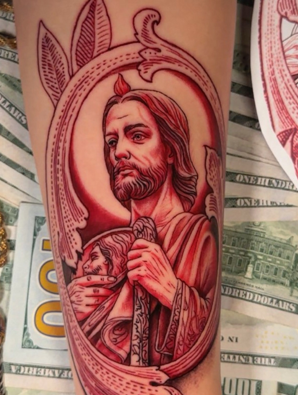 Religious figure with child realism tattoo on the forearm by Omar Sheriff Herrera