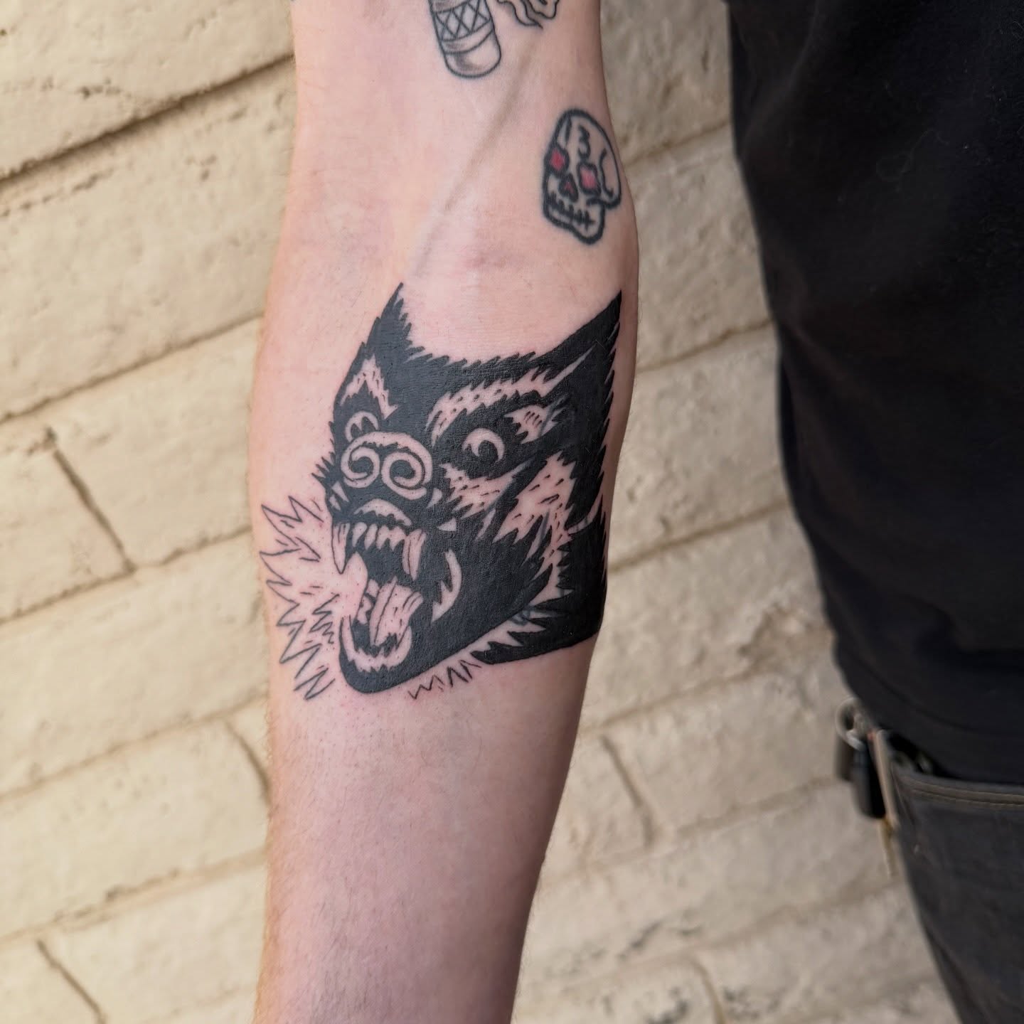Wolf black and grey tattoo on the forearm by Kayla Jackson, Phoenix, Arizona