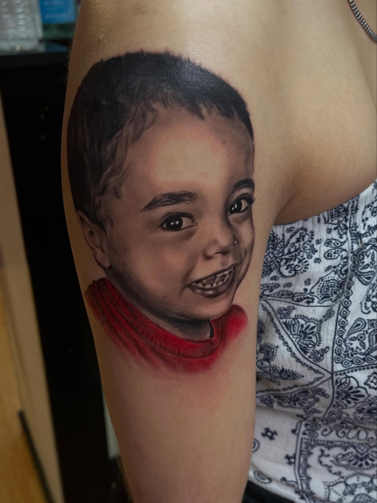 Child portrait realism tattoo on the forearm by Yayo, New Britain, Connecticut