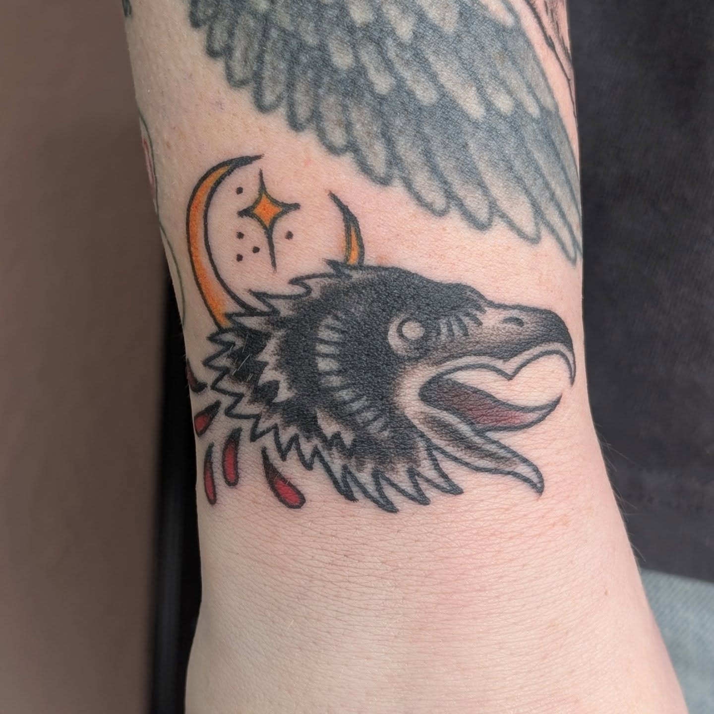 Owl American traditional tattoo on the forearm by Alexandria Green