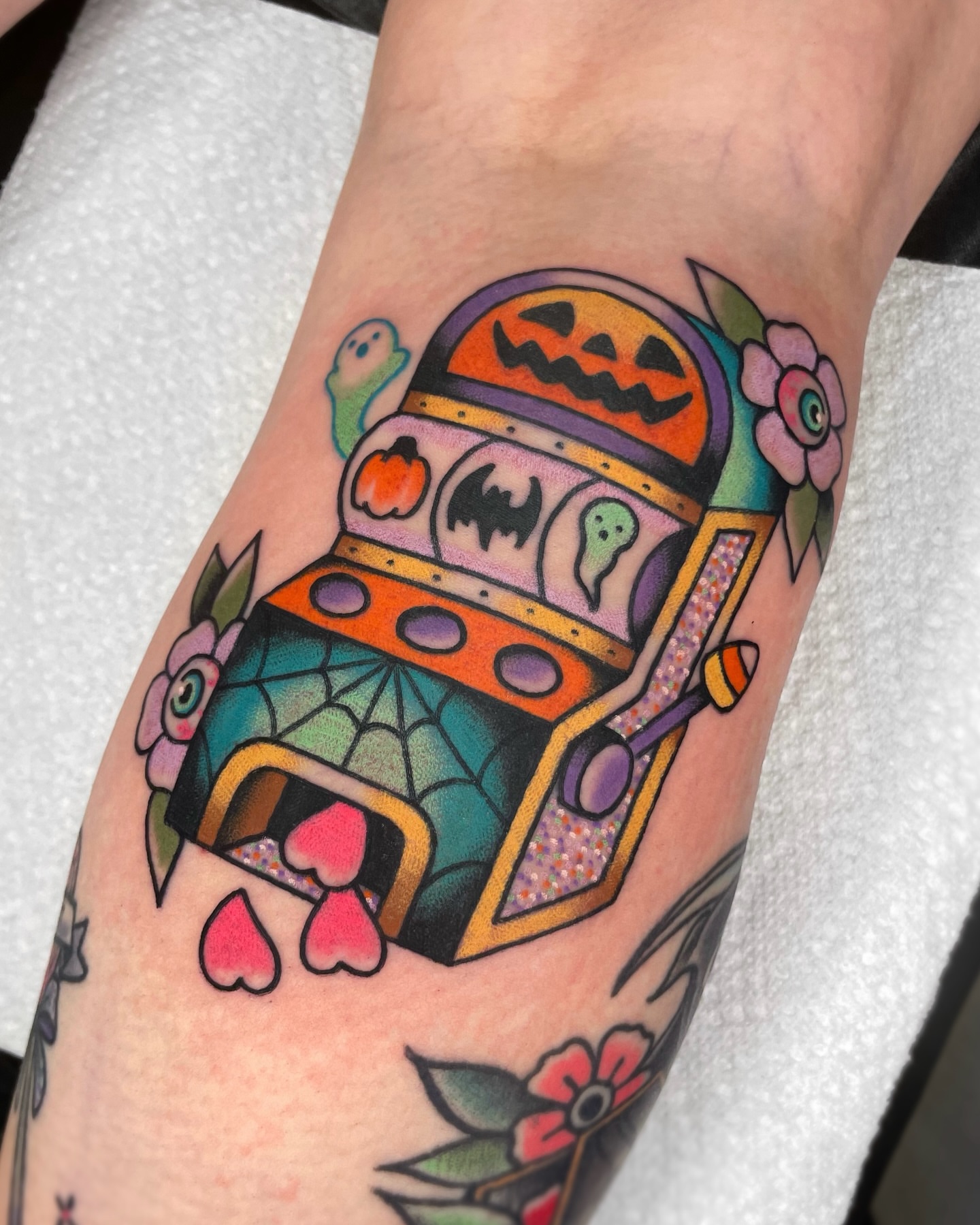 Slot machine American traditional tattoo on the forearm by 𝕬𝖓𝖆𝖇𝖊𝖑𝖑 𝕸𝖔𝖗𝖔