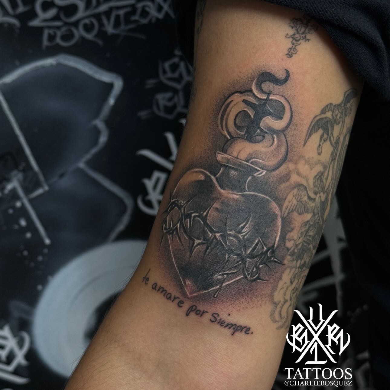 Heart with thorns realism tattoo on the forearm by El Beaver Tattoos