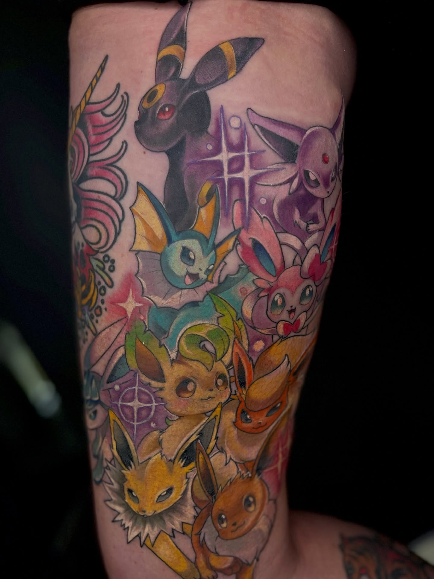 Eevee evolution family anime tattoo on the forearm by Airi