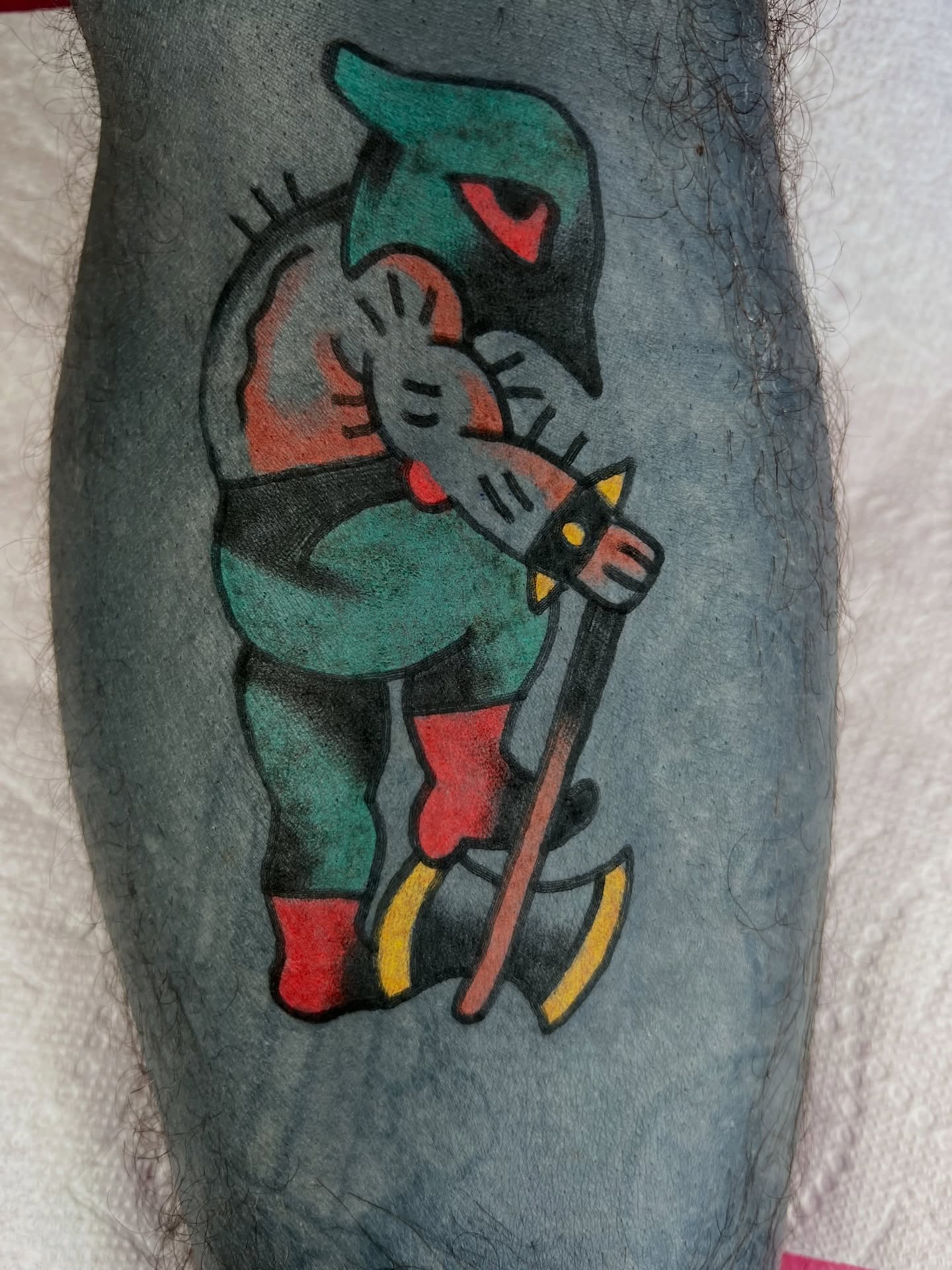 Cat-like creature American traditional tattoo on the leg by Like A Horse Corral