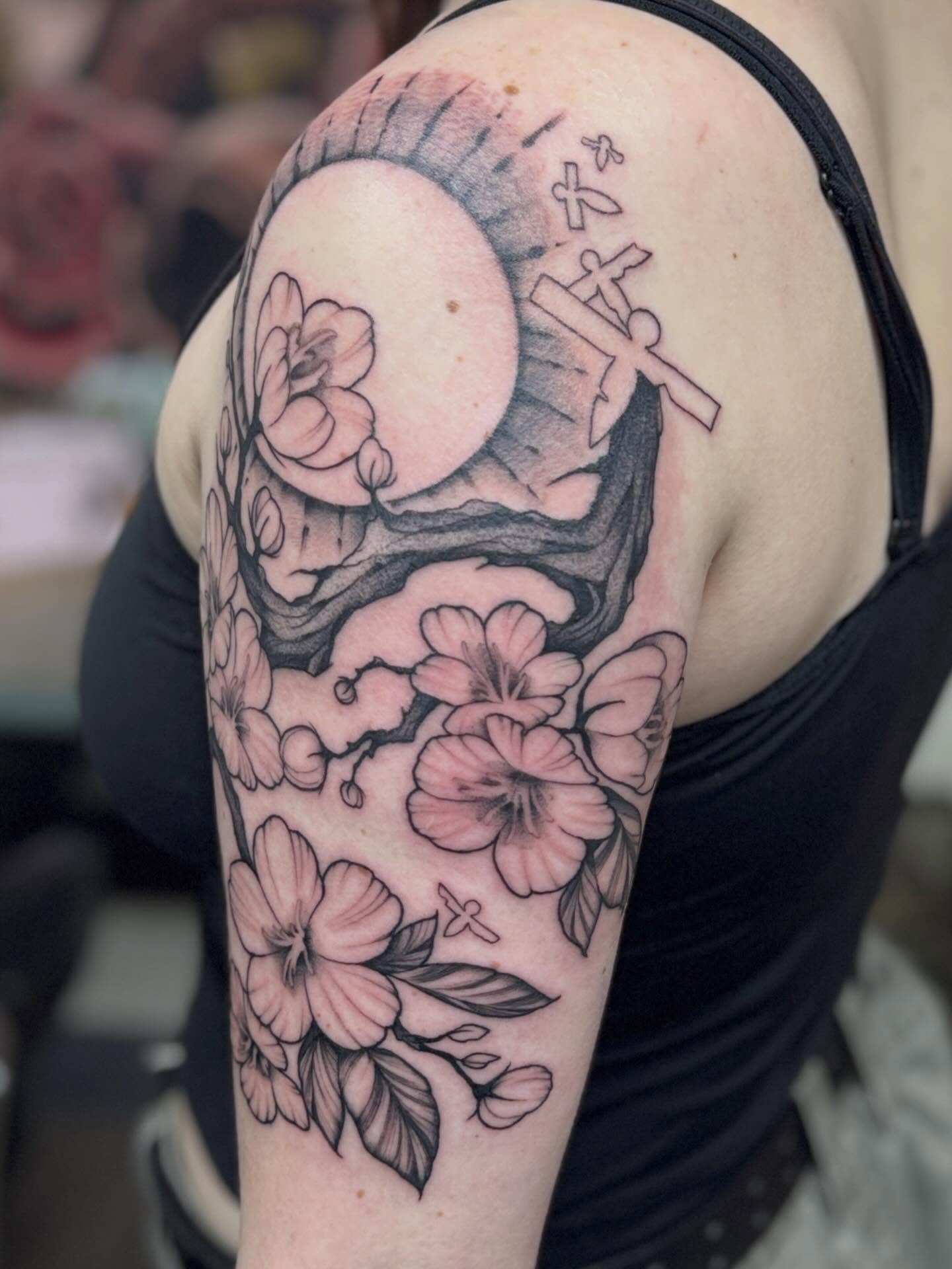 Cherry blossoms and skull japanese irezumi tattoo on the shoulder by Rebecca Rose
