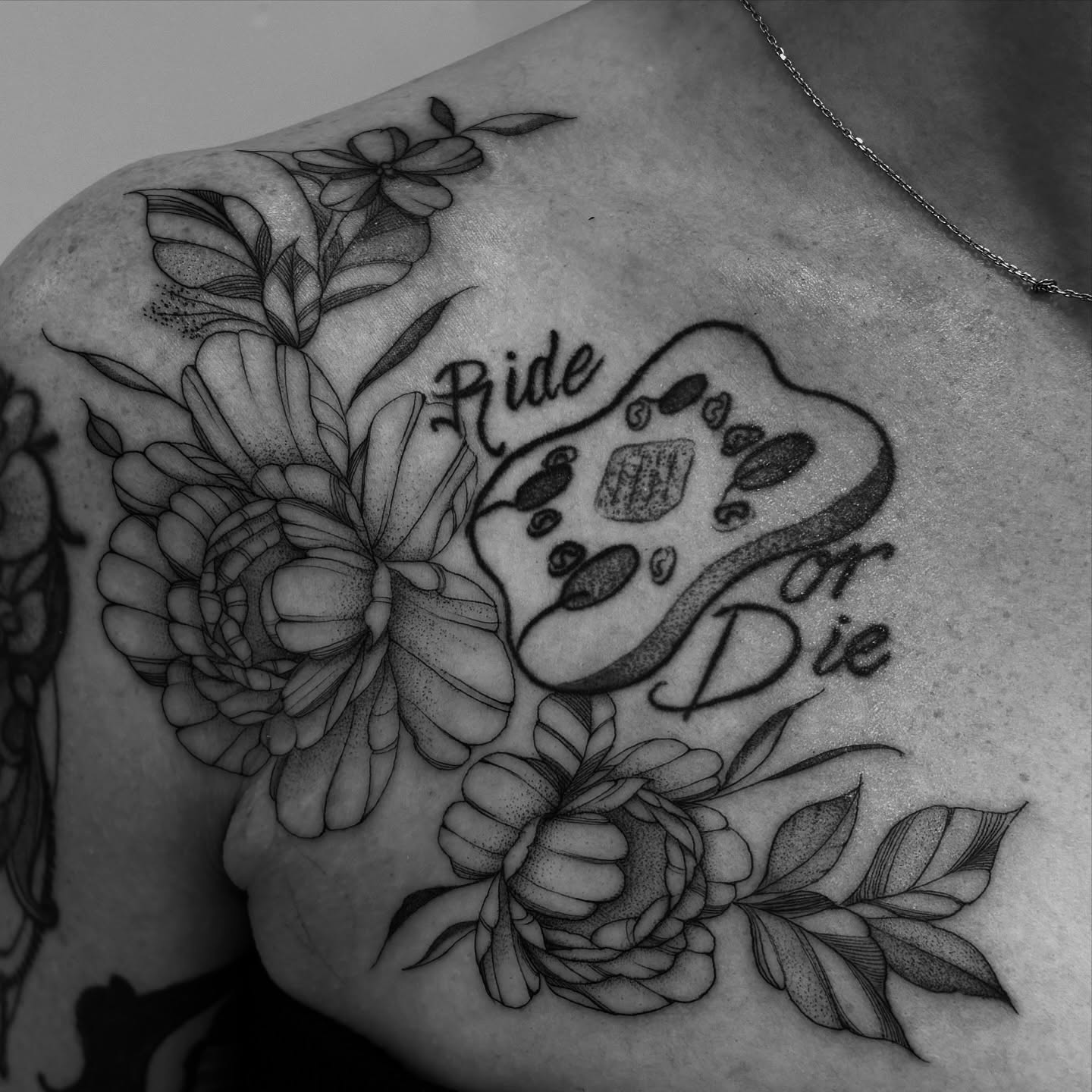Game controller black and grey tattoo on the shoulder by Tayler, Tooele, Utah