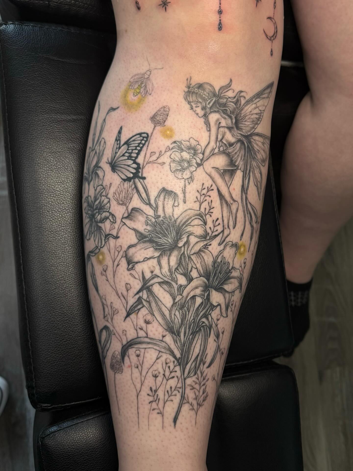 Fairy and flowers realism tattoo on the leg by ✶ teryn ✶, Akron, Ohio