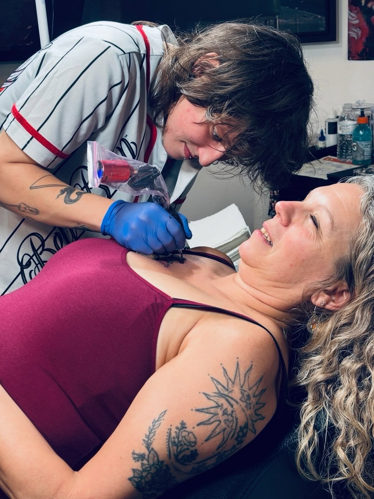 Sun and floral American traditional tattoo on the shoulder by ★𝐑𝐮𝐞★
