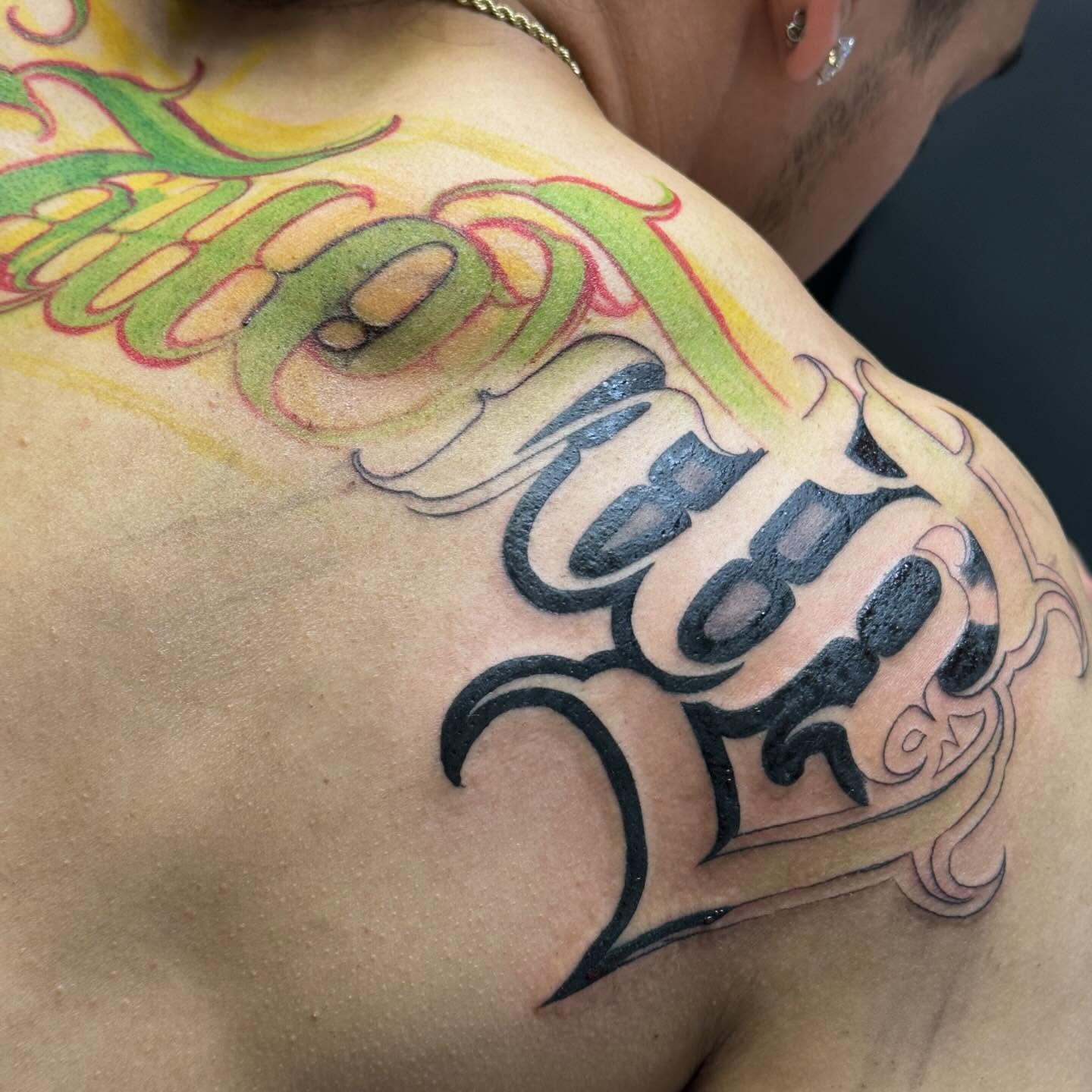 Script lettering lettering script tattoo on the shoulder by El Beaver Tattoos