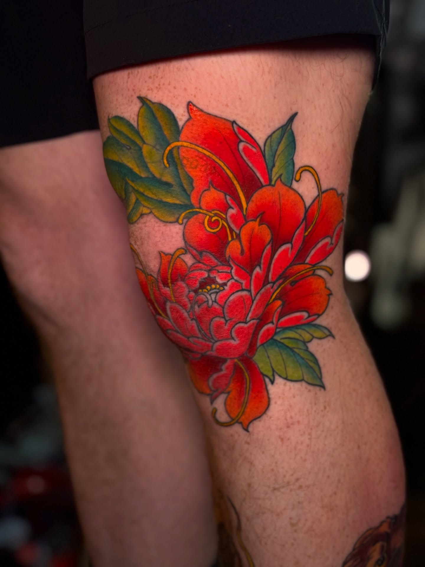 Floral bouquet American traditional tattoo on the thigh by Matthew - Tattoo Artist