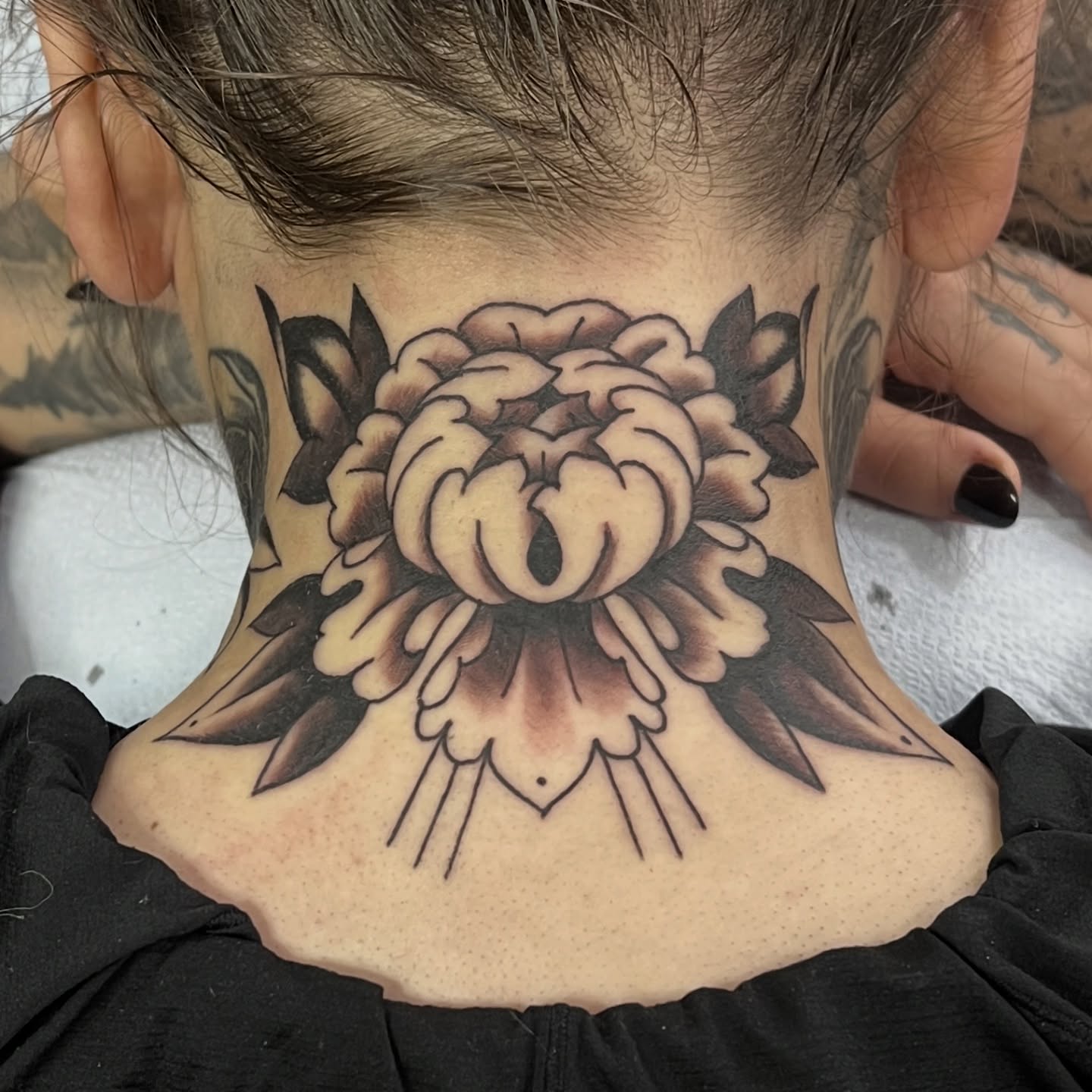 Peony American traditional tattoo on the neck by @brandonhuckabey, Denver, Colorado