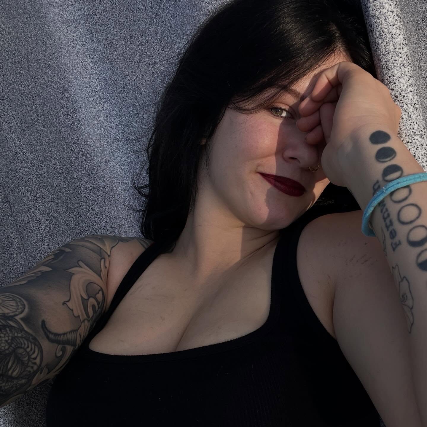 Woman American traditional tattoo on the upper arm by Rebecca Kern Tattoos