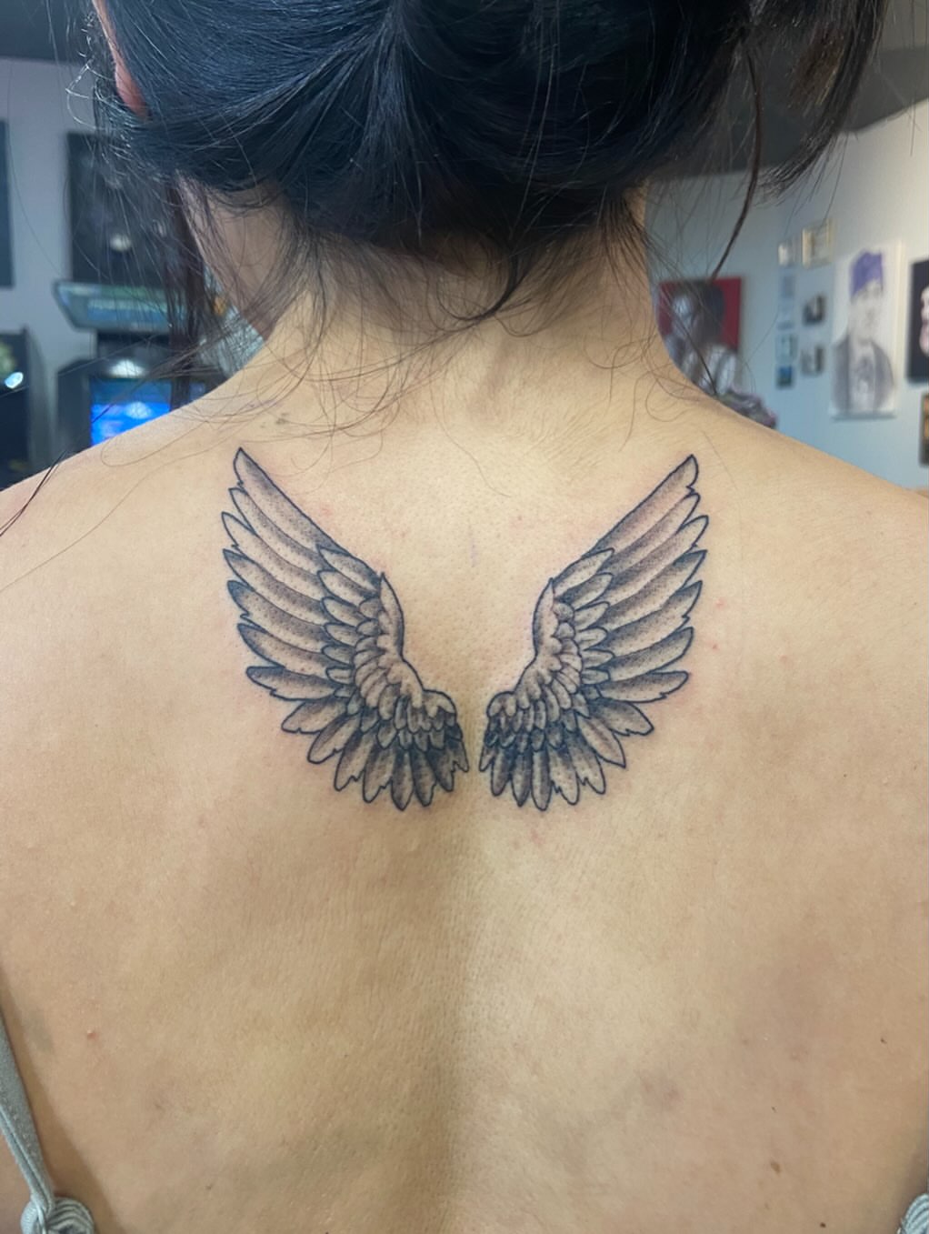 Wings black and grey tattoo on the back by Sam Hearnen, Lawrence, Kansas