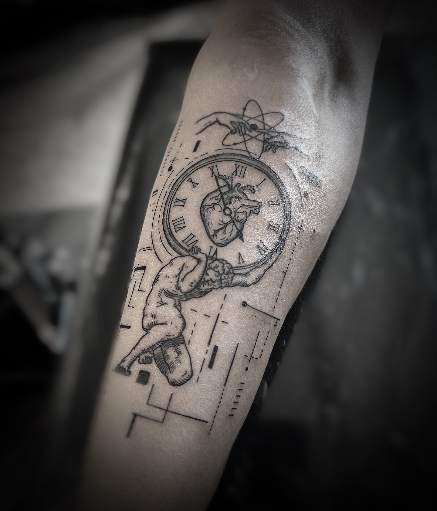 Clock with cherub realism tattoo on the forearm by Jadyn Pang