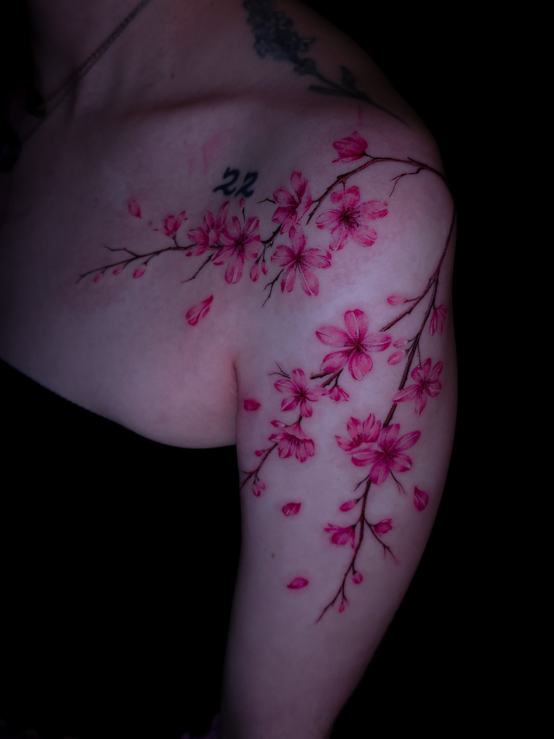 Cherry blossoms realism tattoo on the shoulder by Viktoriia ▪︎ Tattoo ▪︎ Chicago ▪︎ Naperville