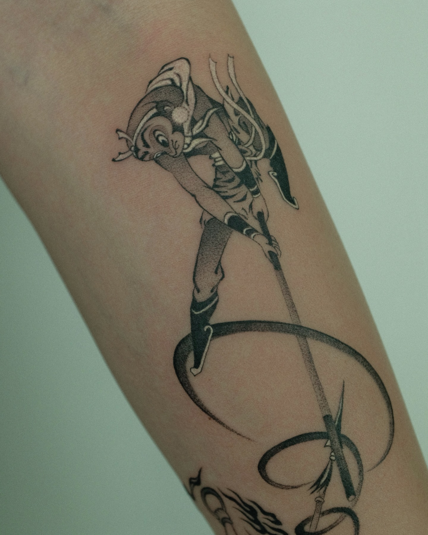 Circus performer black and grey tattoo on the forearm by Xiao Lun