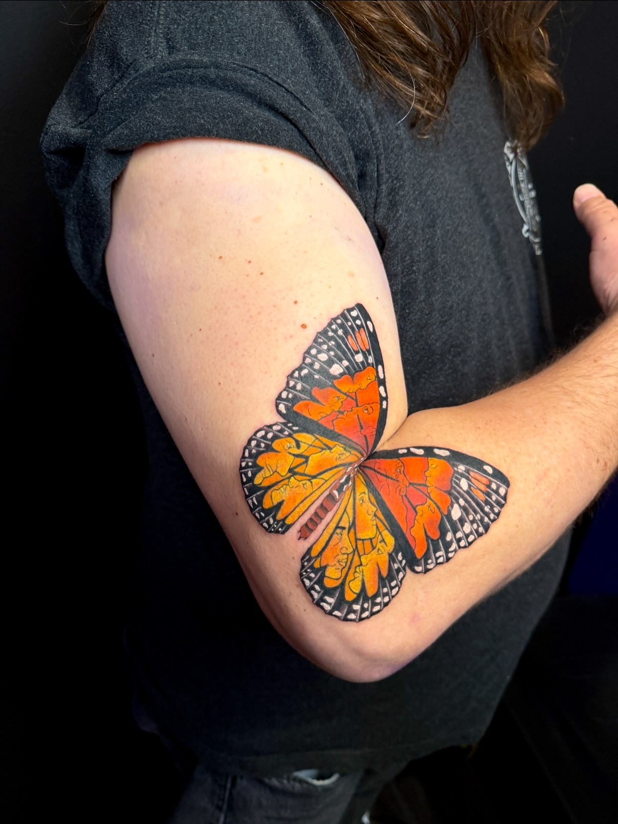 Monarch butterfly realism tattoo on the upper arm by aria, Austin, Texas