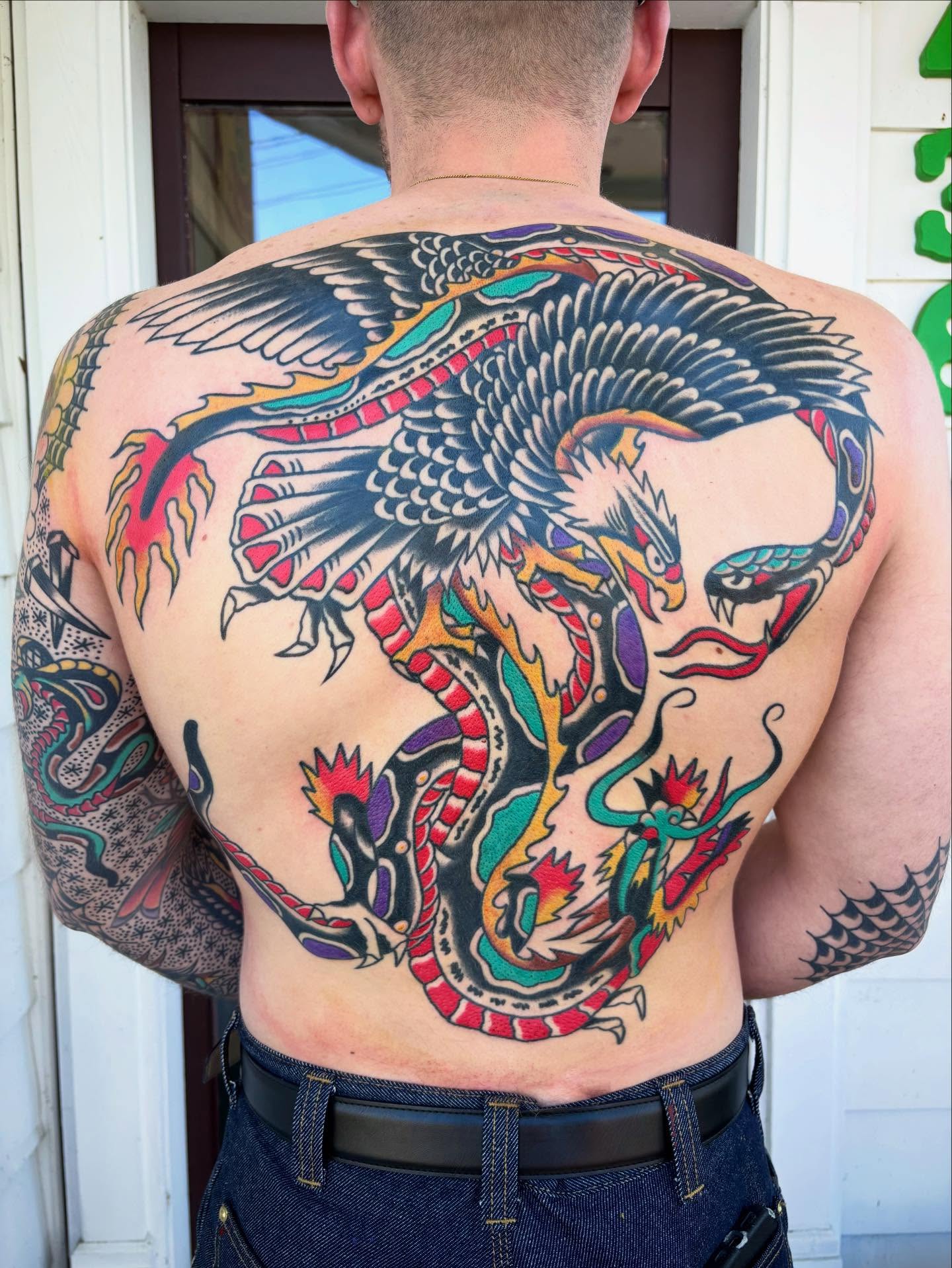 Dragon American traditional tattoo on the back by 🌹